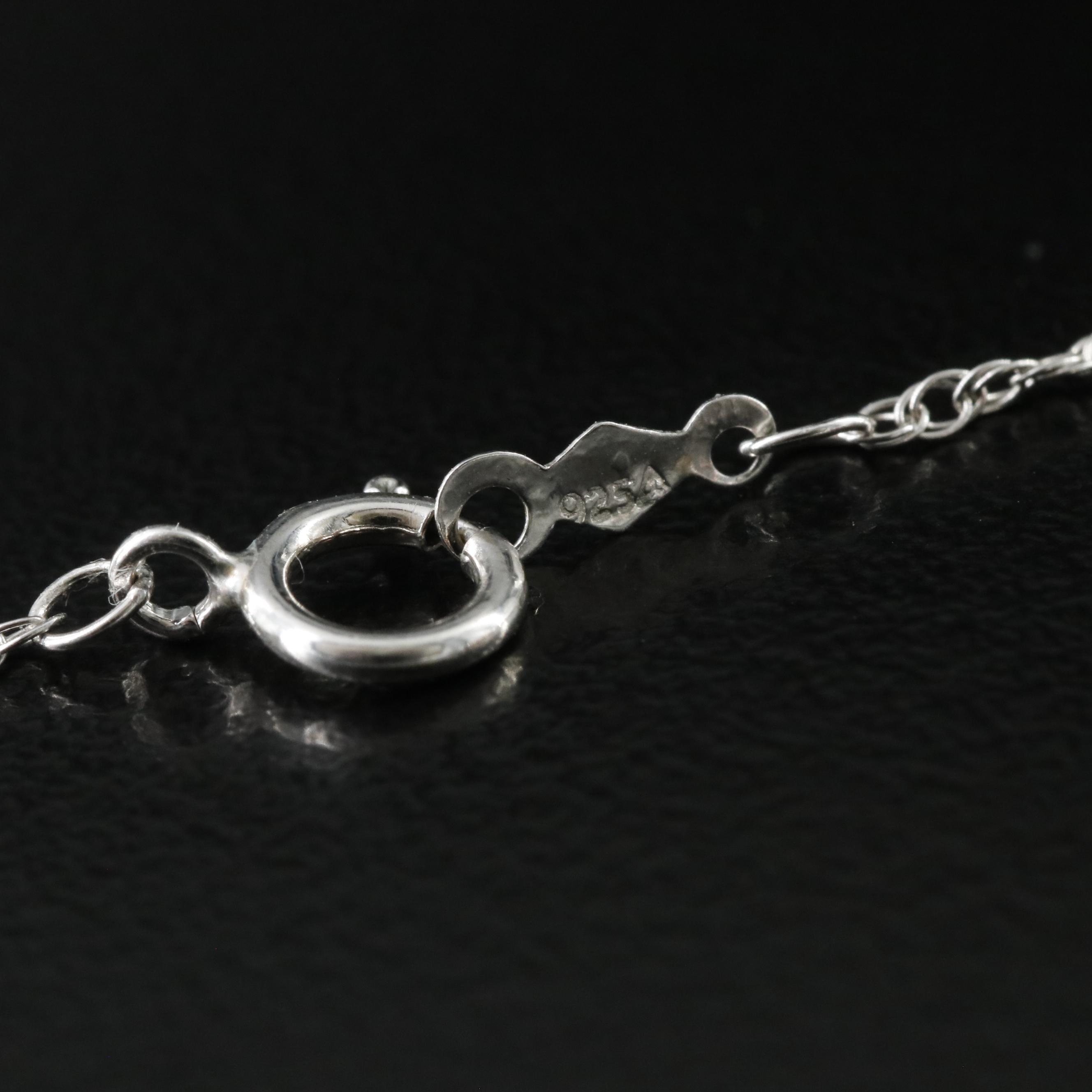 Sterling CZ Twist Pendant Necklace