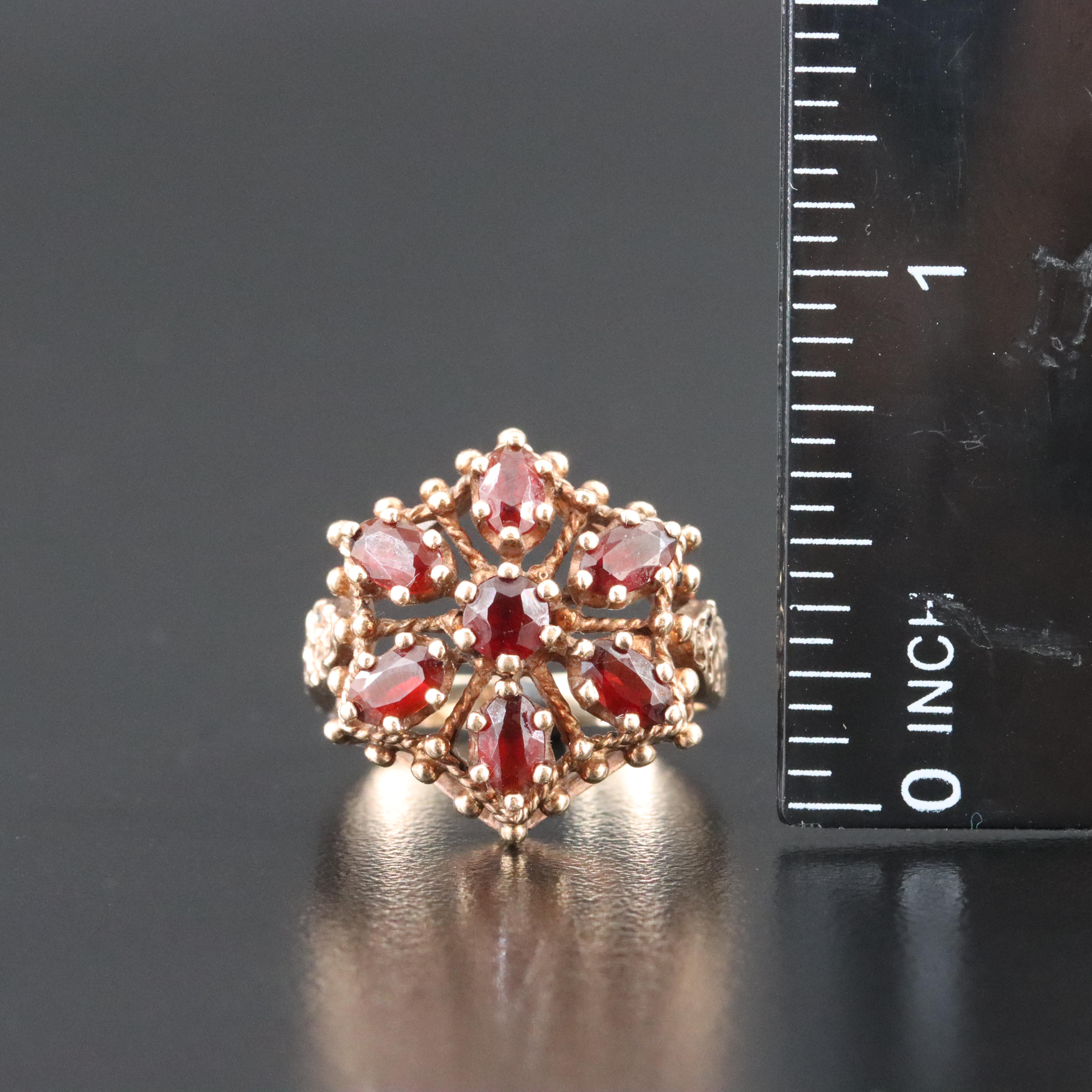 10K Garnet Flower Ring