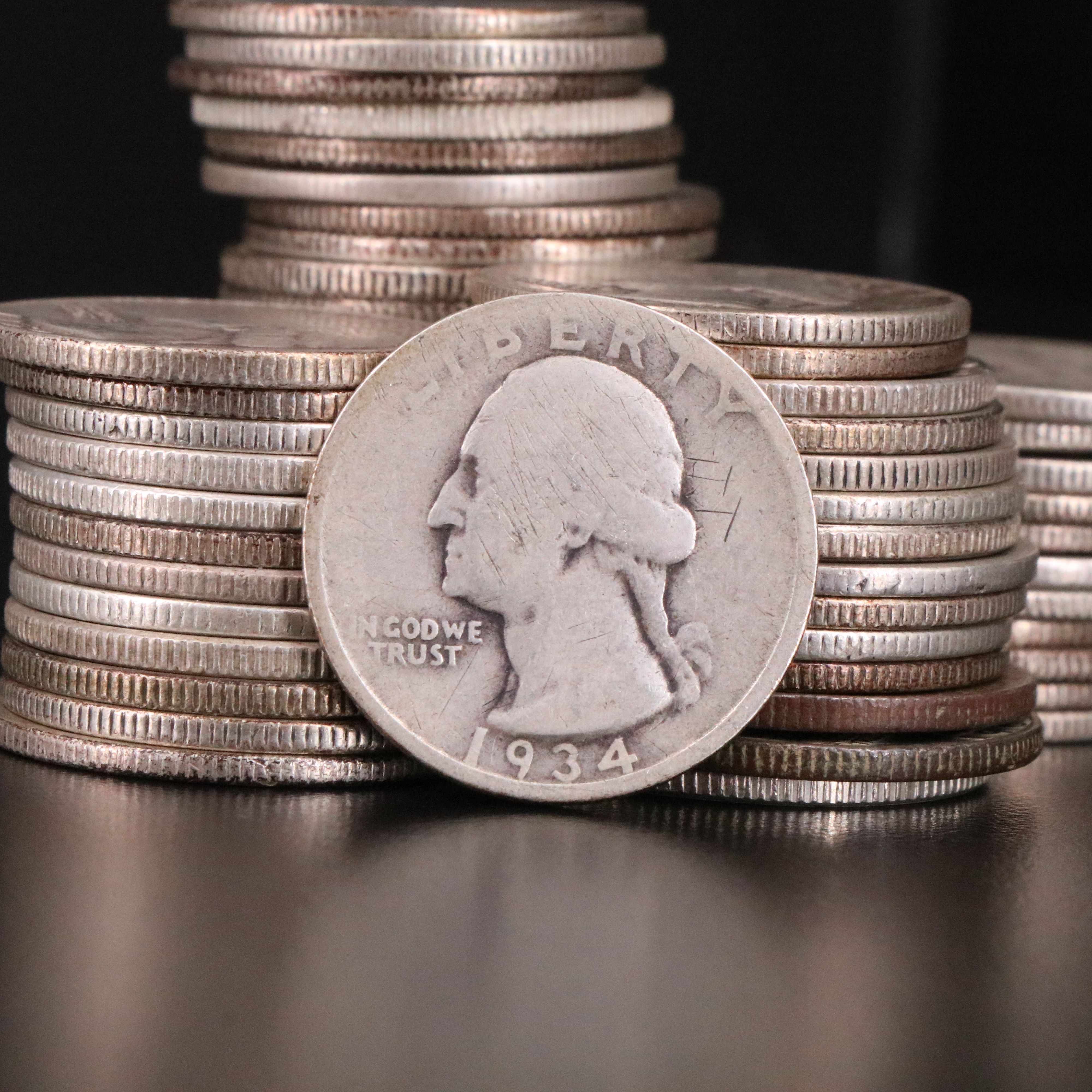 Sixty-Seven Washington Silver Quarters