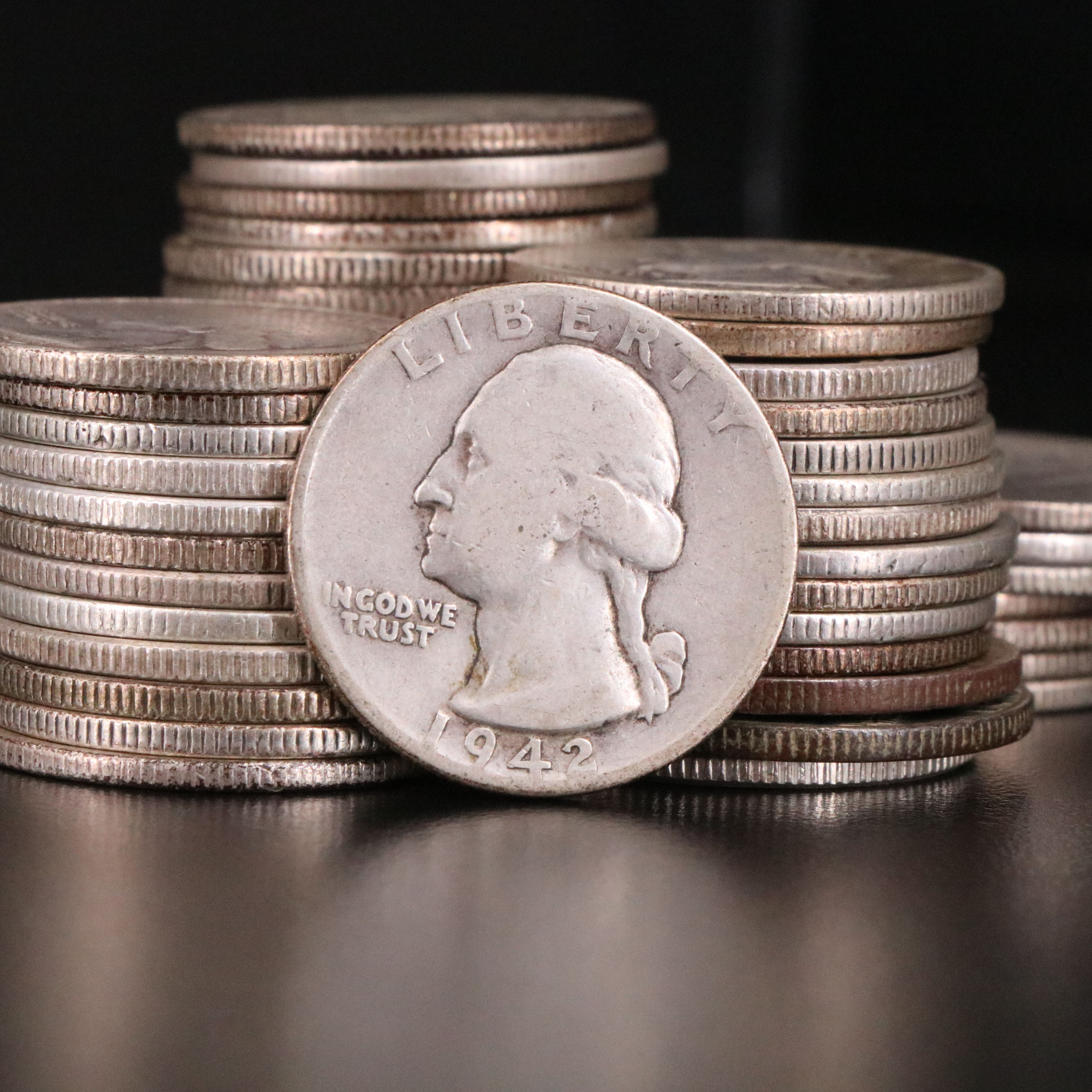 Sixty-Seven Washington Silver Quarters