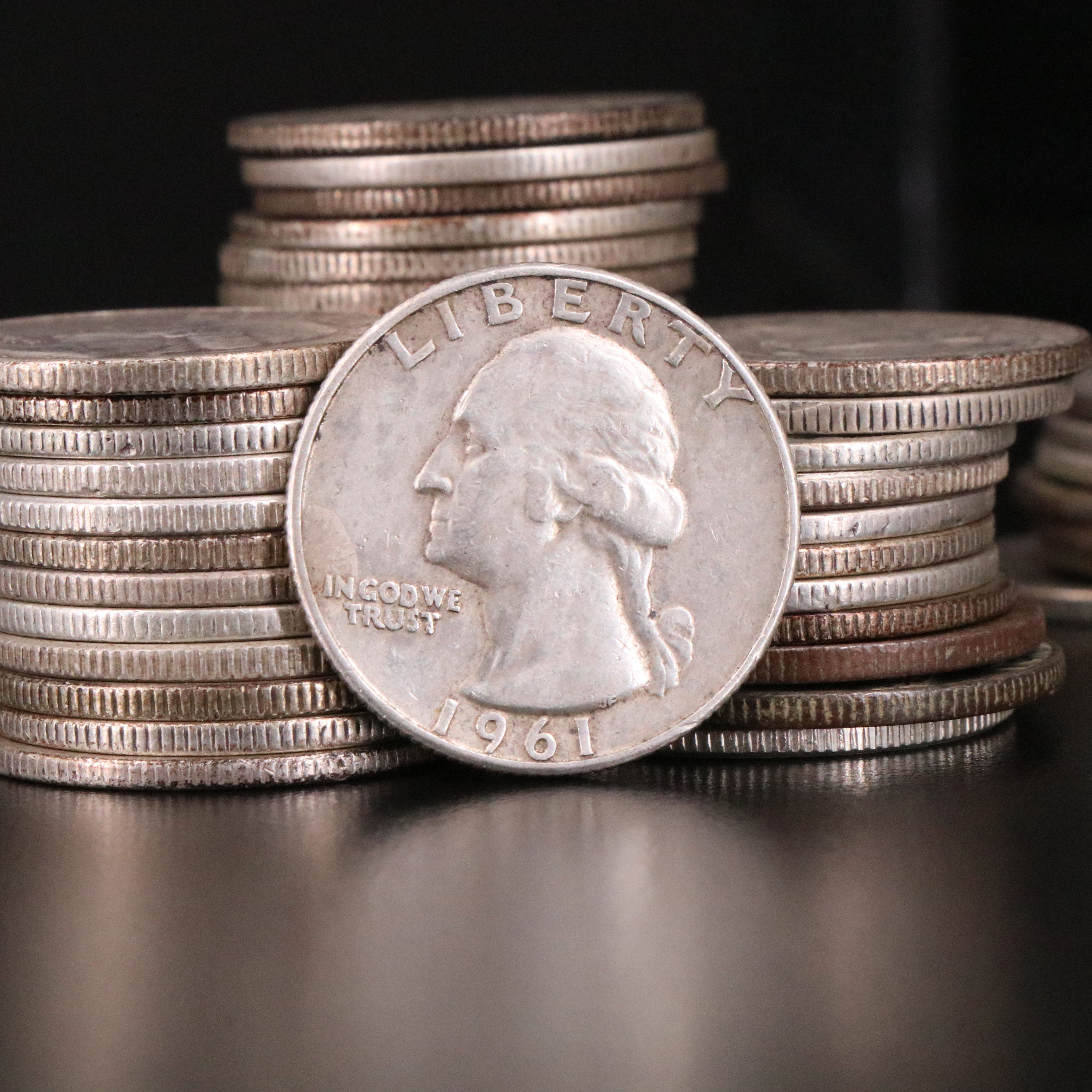 Sixty-Seven Washington Silver Quarters