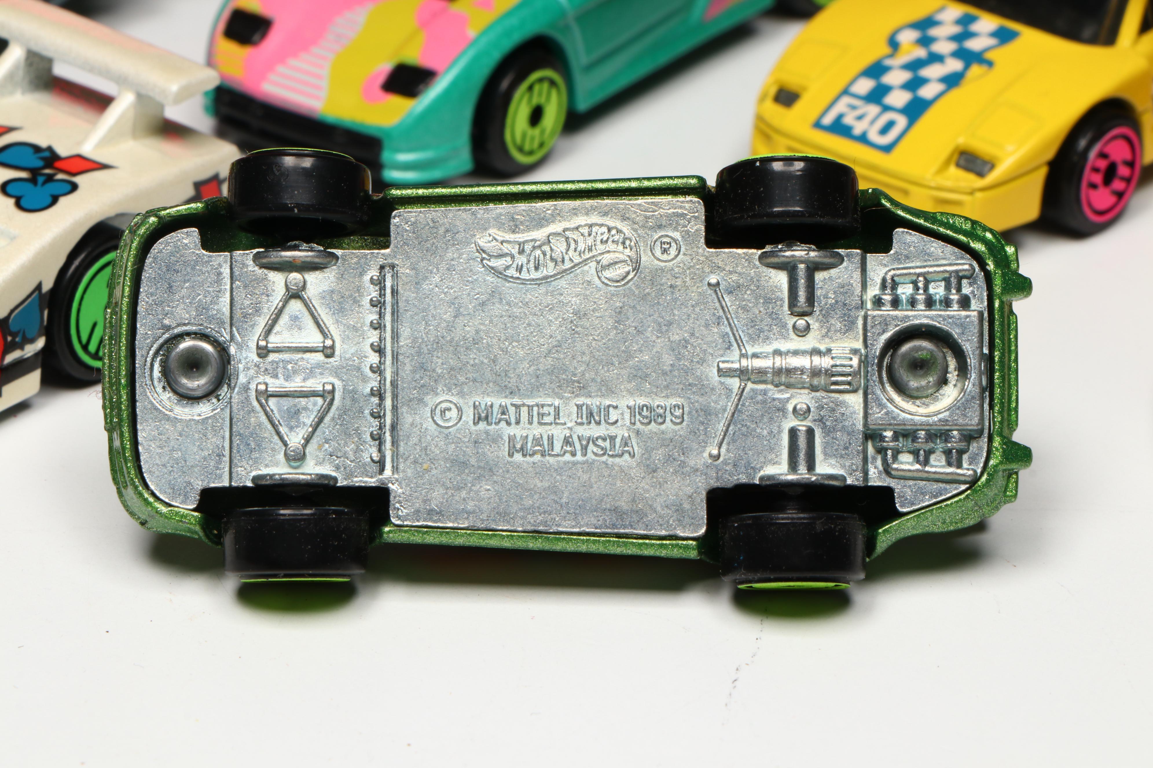 Hot Wheels "308 SEL" with Other Toy Cars and Collector's Case