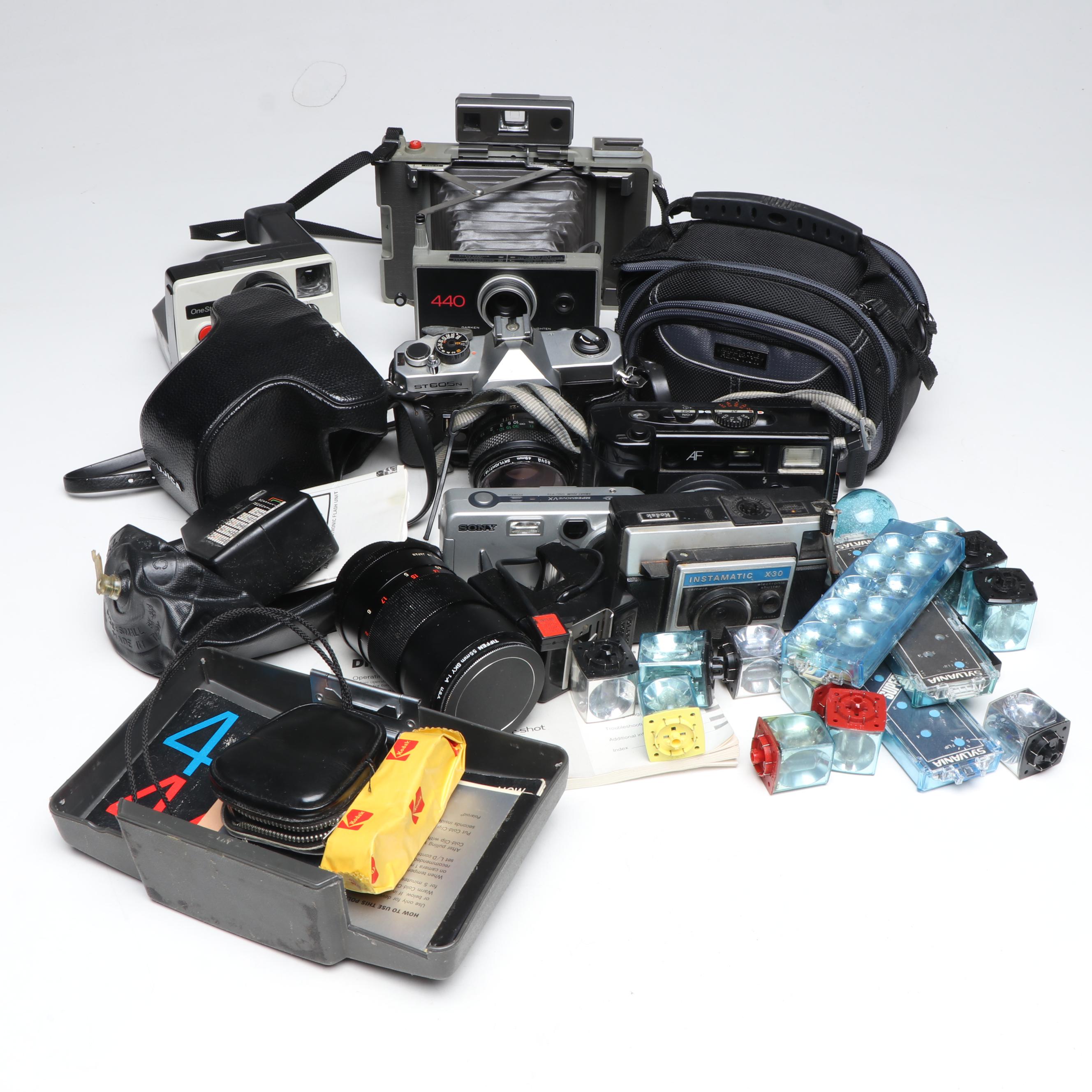 Polaroid 440 Automatic Land Camera with More Cameras and Accessories