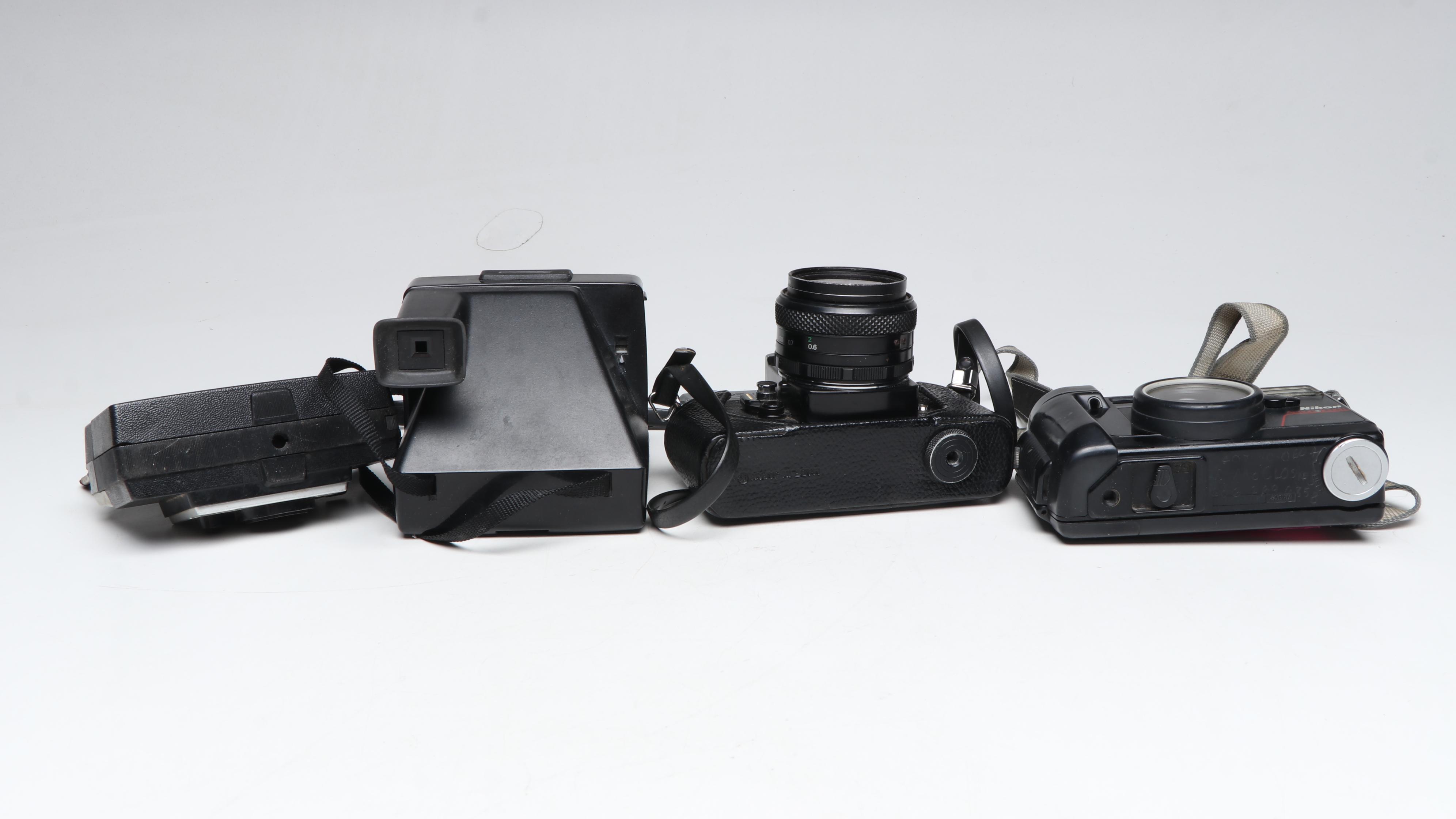 Polaroid 440 Automatic Land Camera with More Cameras and Accessories