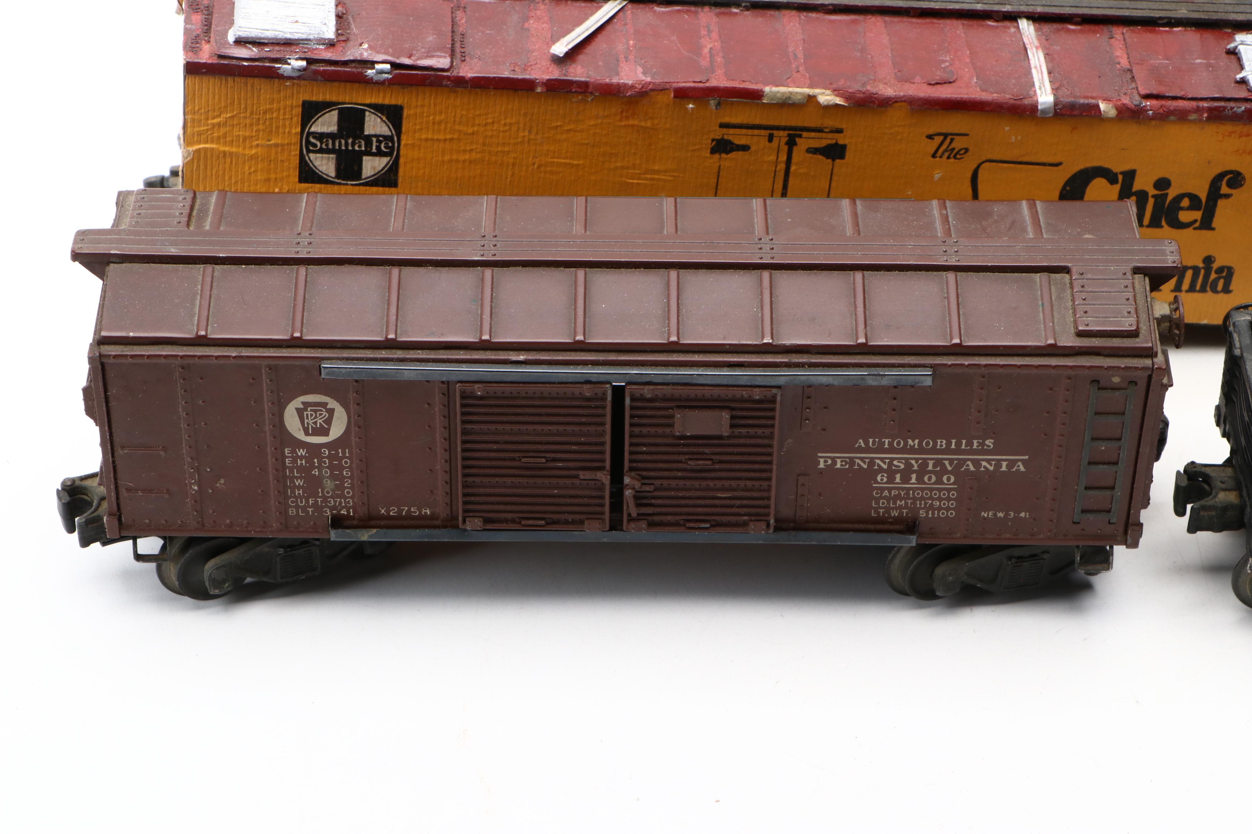 Lionel Steam Locomotive with Santa Fe Super Chief Boxcar and More Model Trains