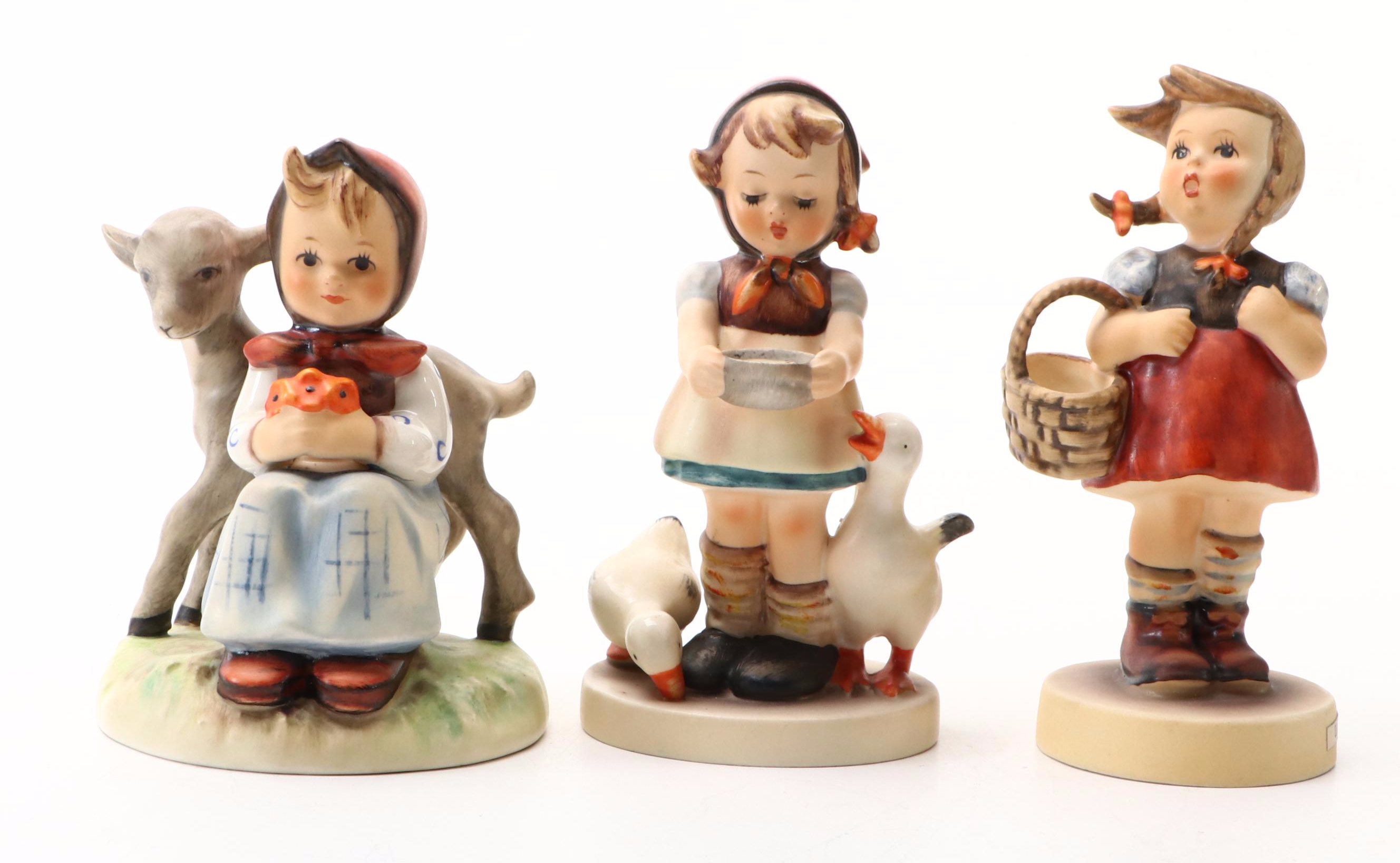 Goebel "School Boy," "I Bring You a Gift," and More Porcelain Hummel Figurines