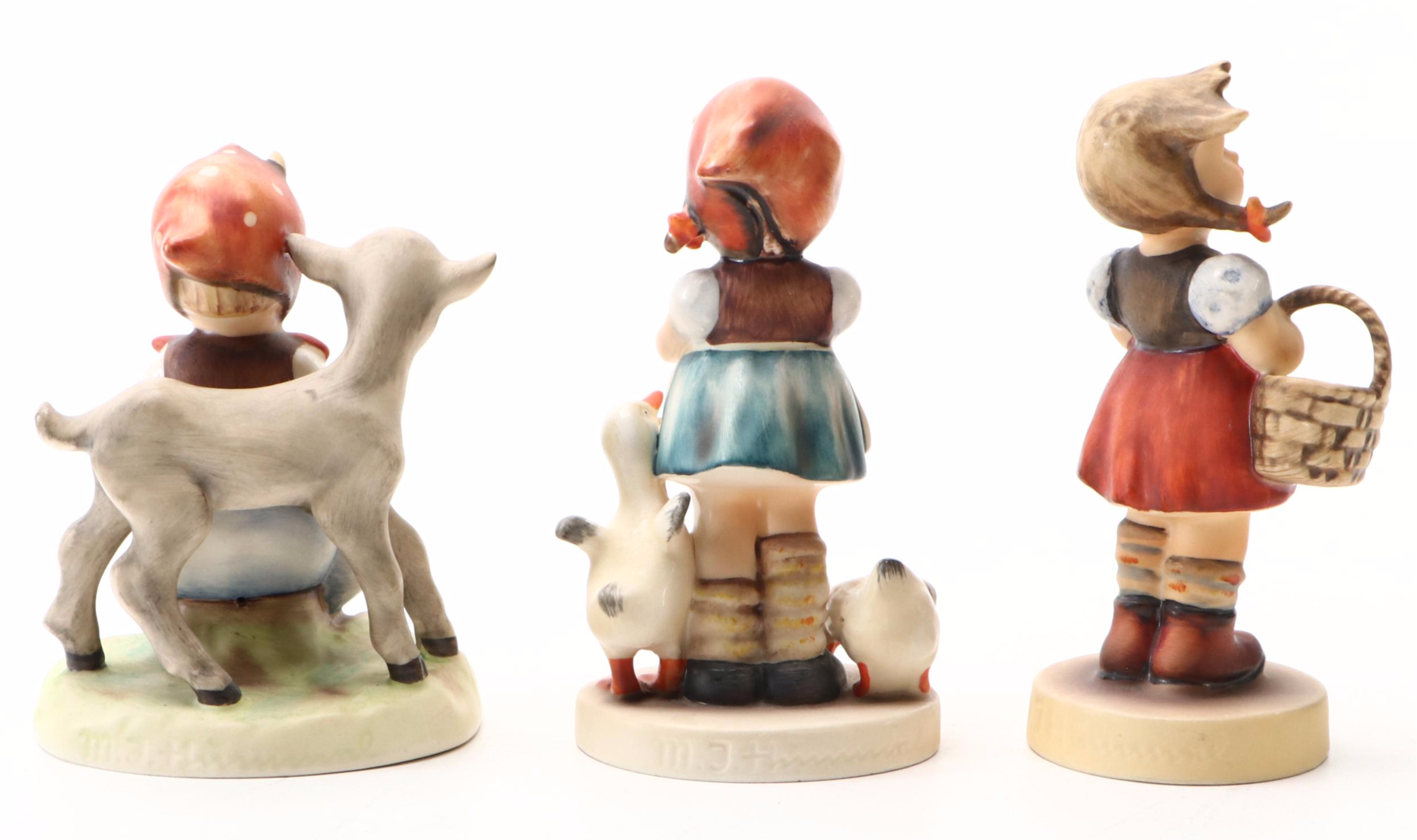 Goebel "School Boy," "I Bring You a Gift," and More Porcelain Hummel Figurines