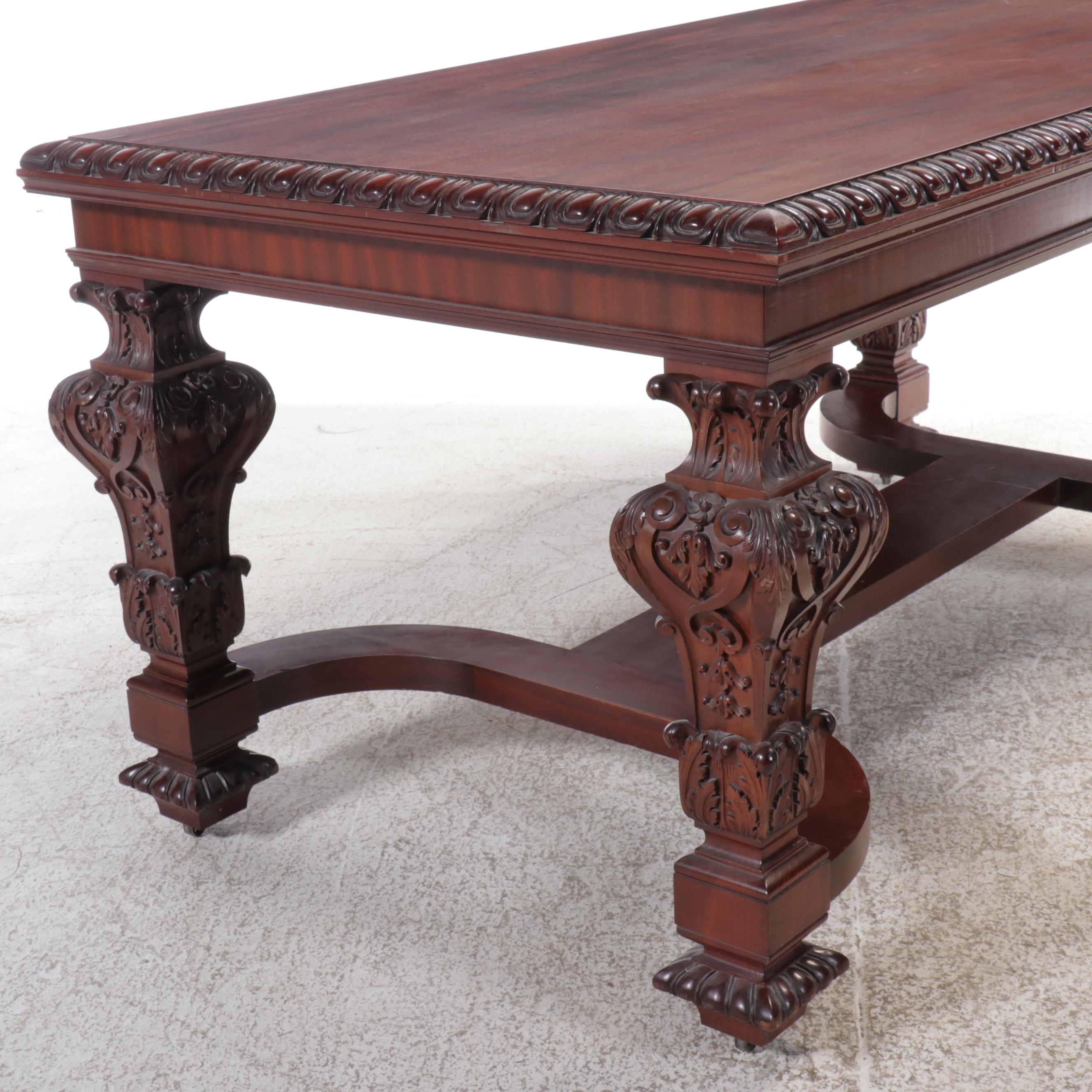 Jacobean Style Carved Mahogany Library Table on Casters, 20th Century