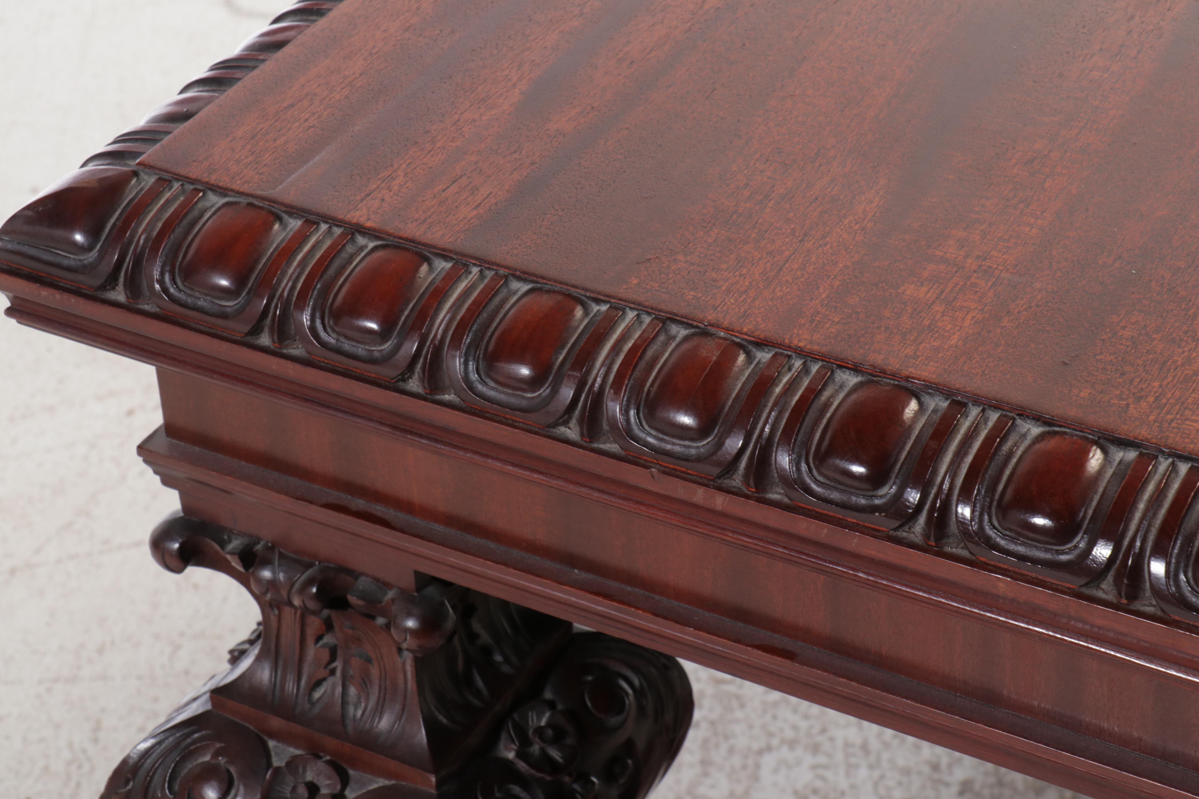 Jacobean Style Carved Mahogany Library Table on Casters, 20th Century