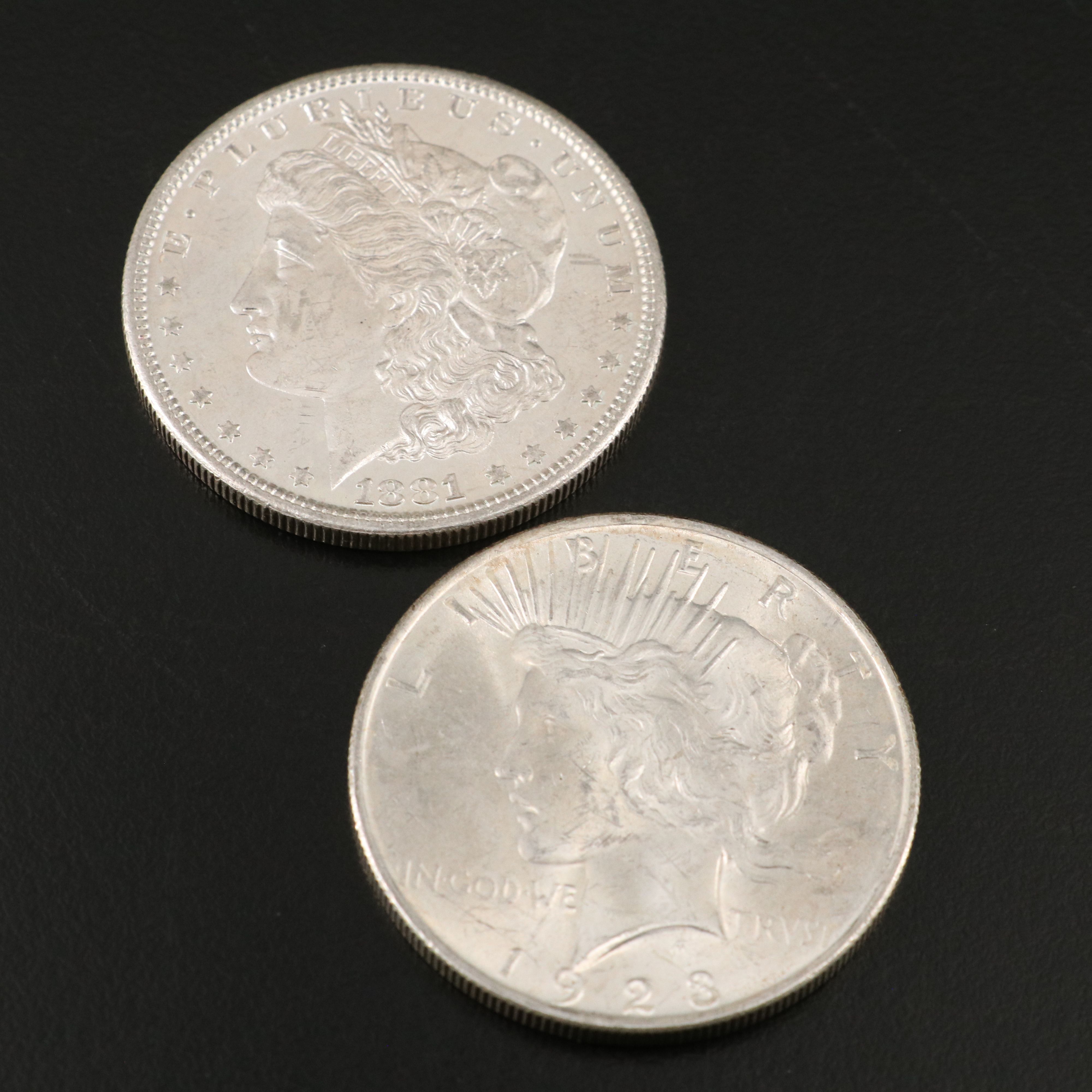 Two U.S. Morgan and Peace Silver Dollars