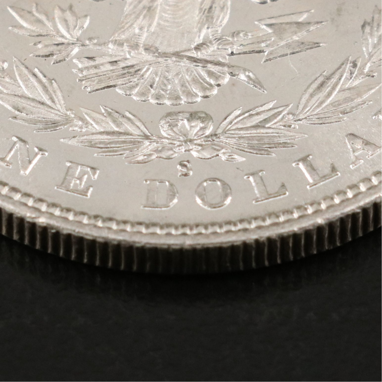 Two U.S. Morgan and Peace Silver Dollars