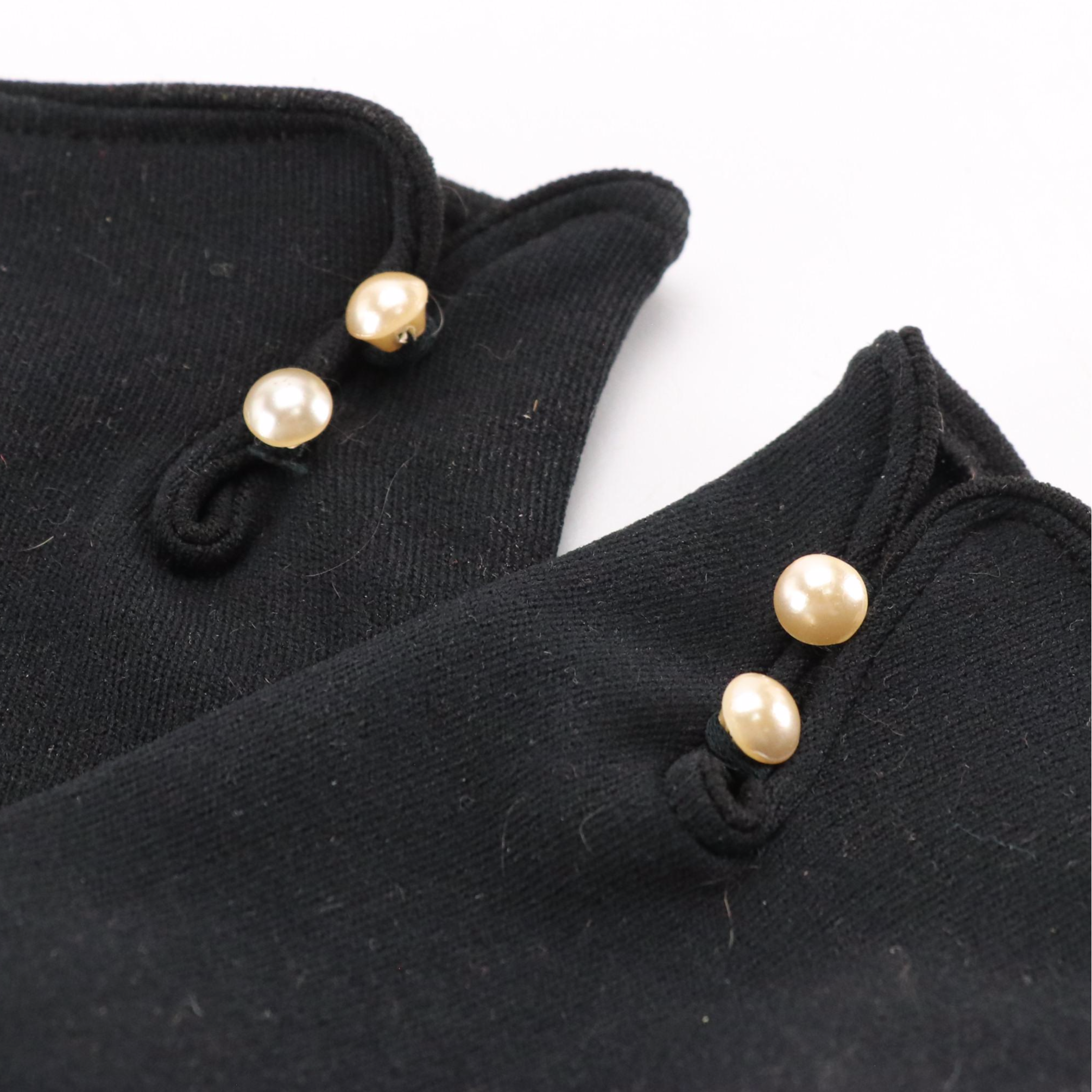 Black Shortie and Off-White Bracelet Length Fashion Gloves, circa 1960