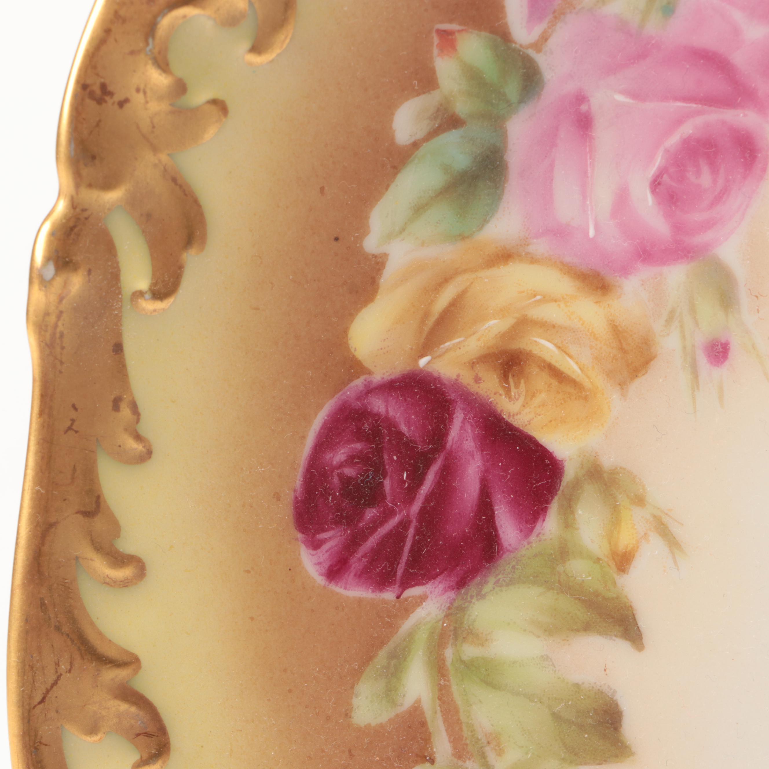 European Floral Porcelain Plates and Vases with Other Table Accessories
