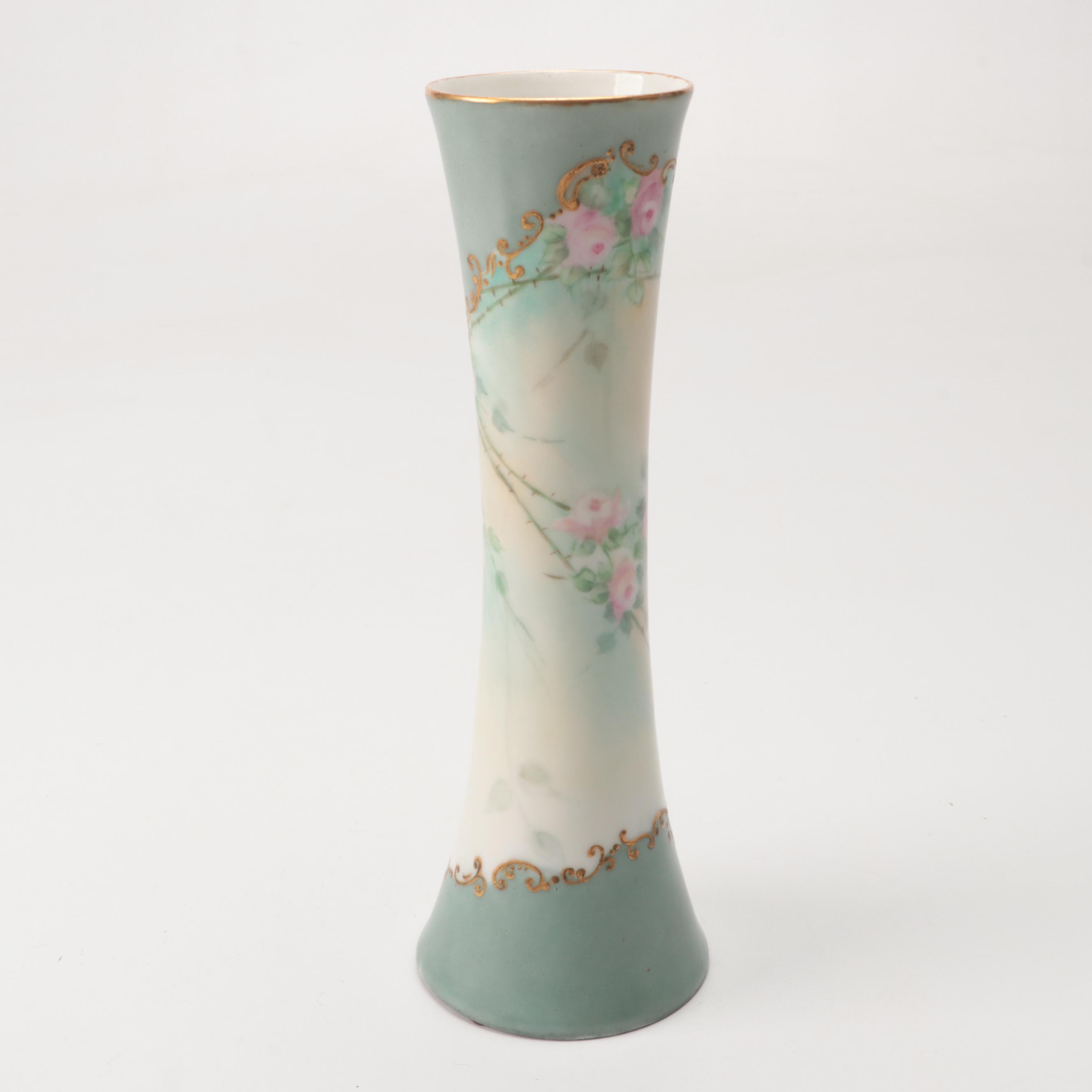 European Floral Porcelain Plates and Vases with Other Table Accessories