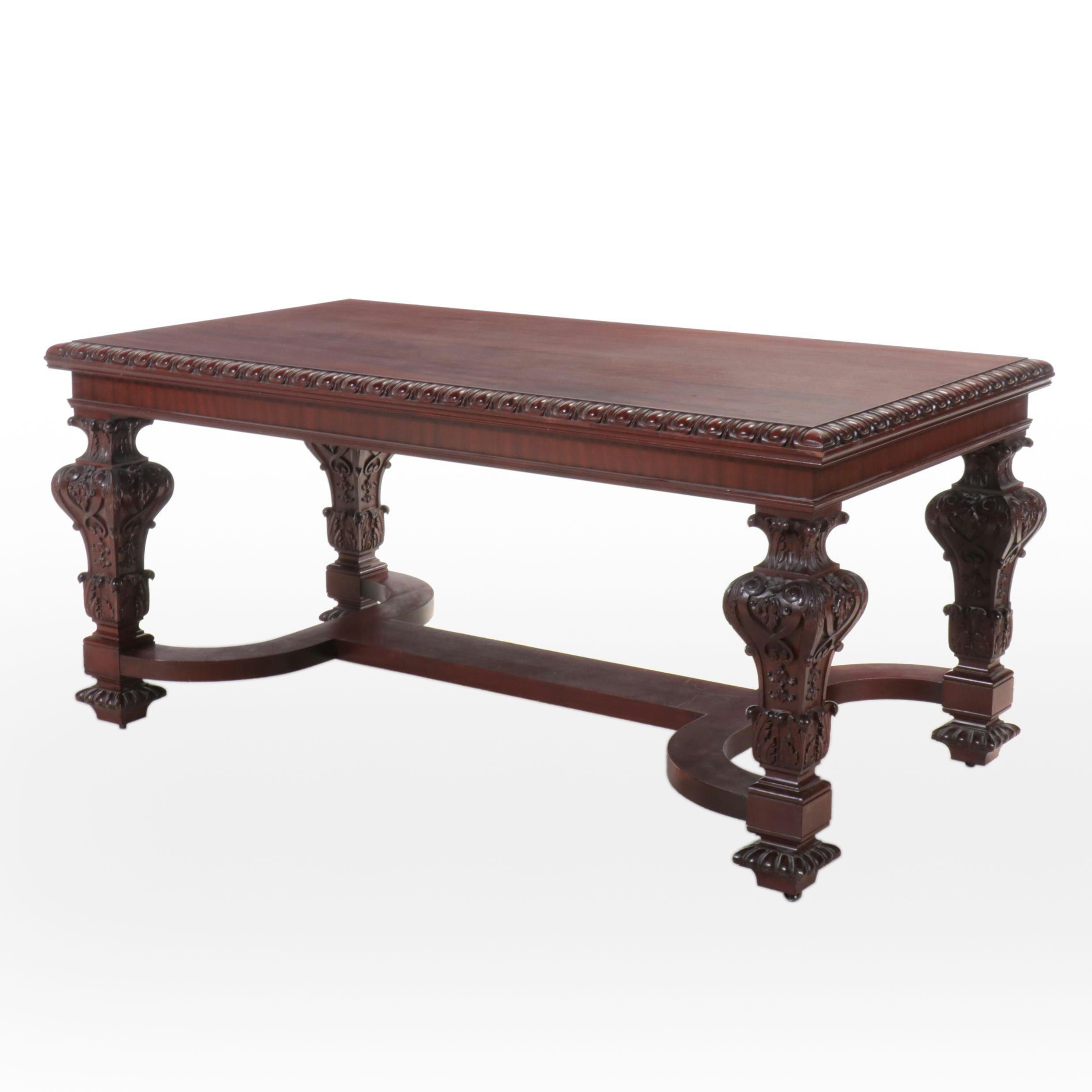 Jacobean Style Carved Mahogany Library Table on Casters, 20th Century