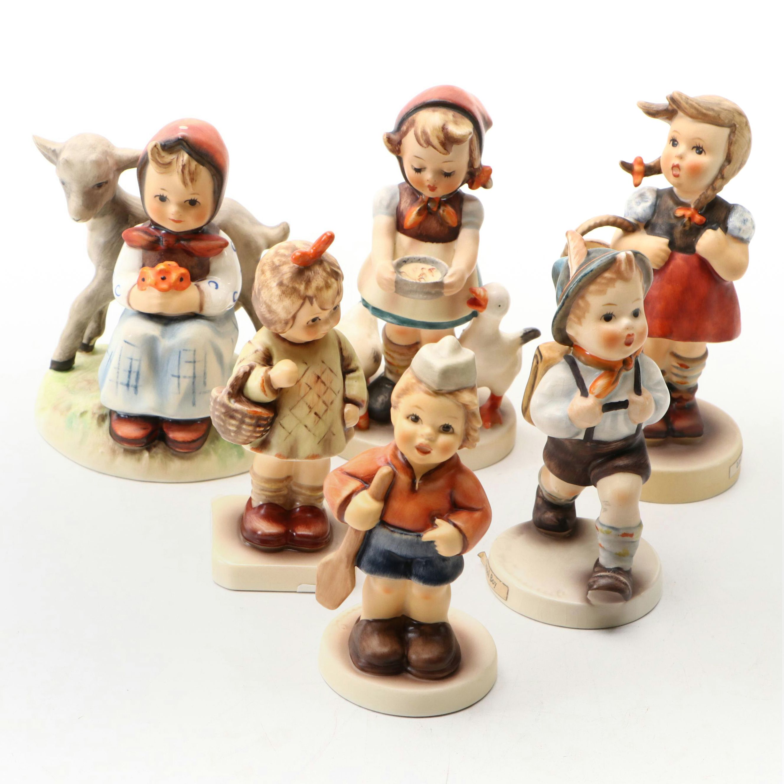Goebel "School Boy," "I Bring You a Gift," and More Porcelain Hummel Figurines