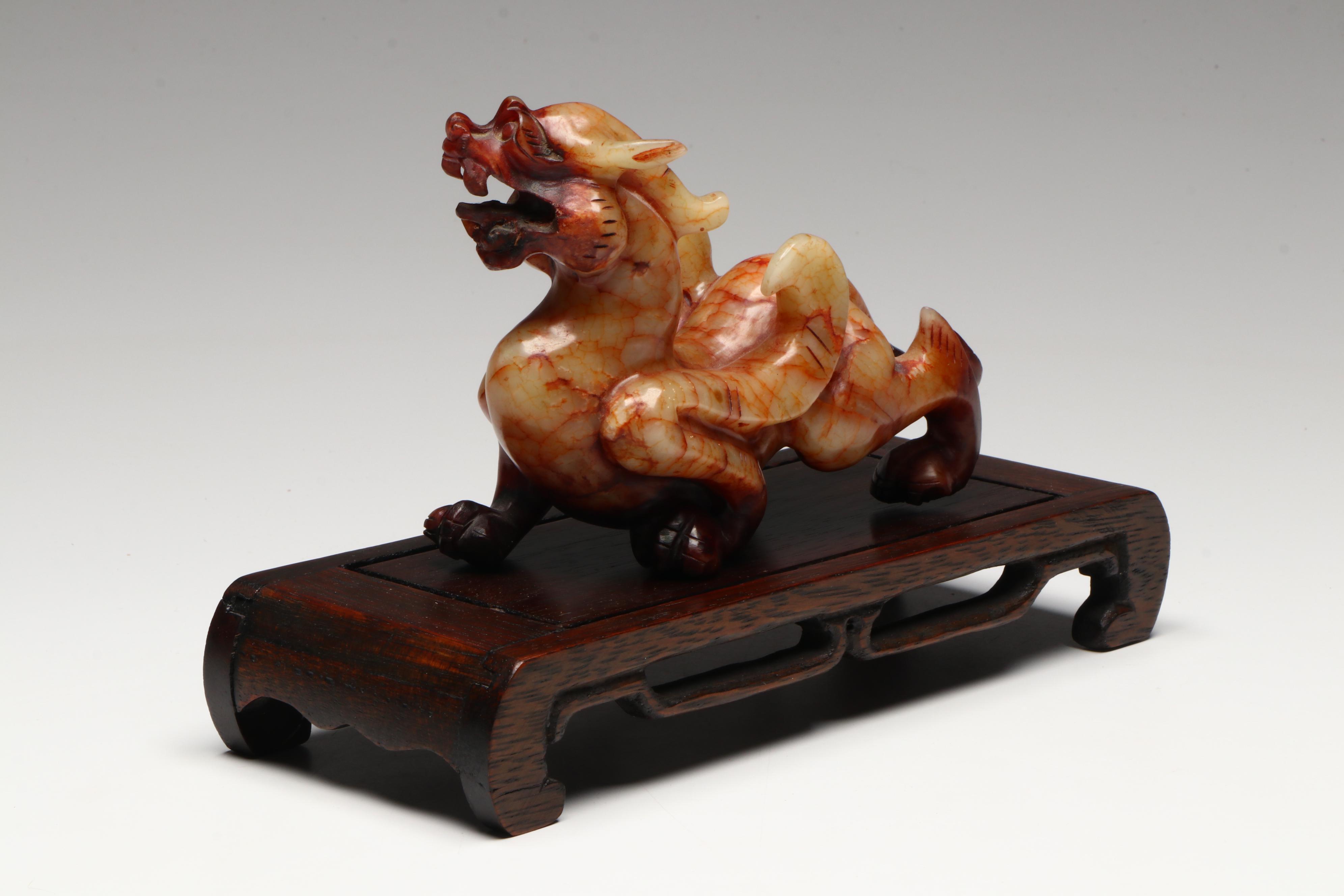 Pair of Chinese Serpentine Dragons on Carved Wood Stands