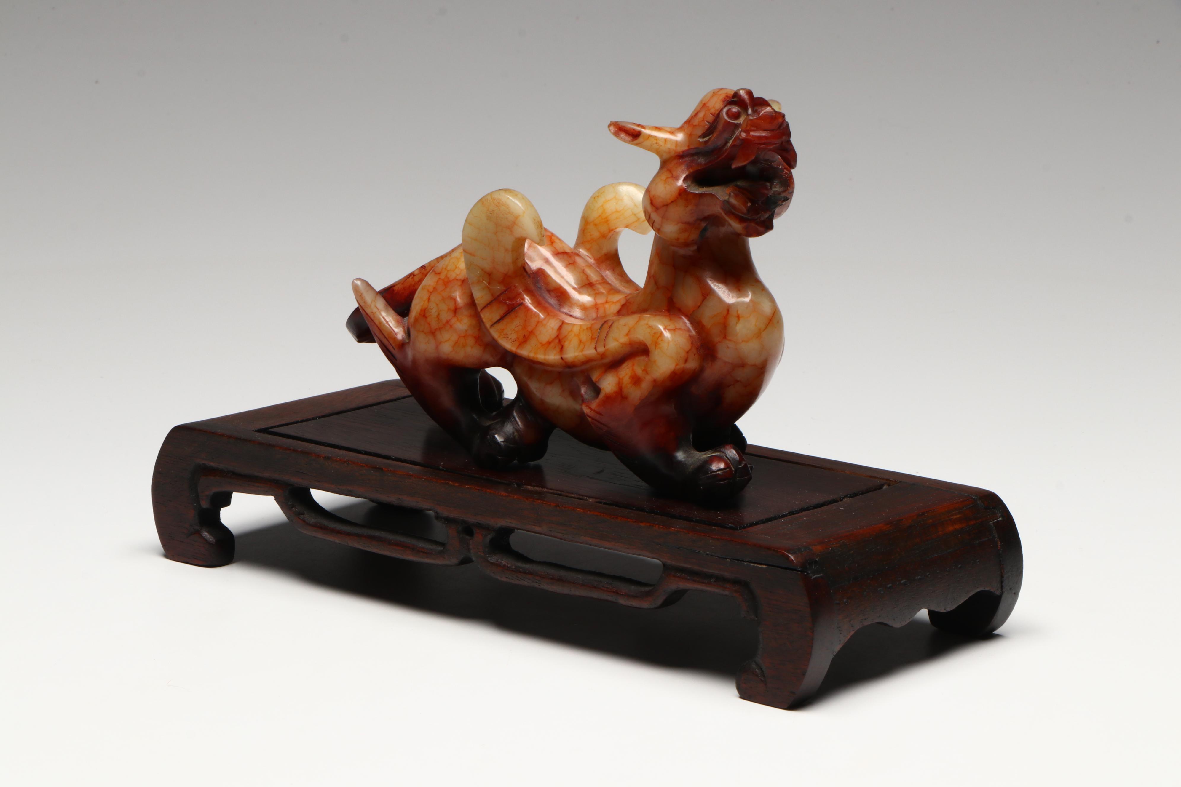 Pair of Chinese Serpentine Dragons on Carved Wood Stands