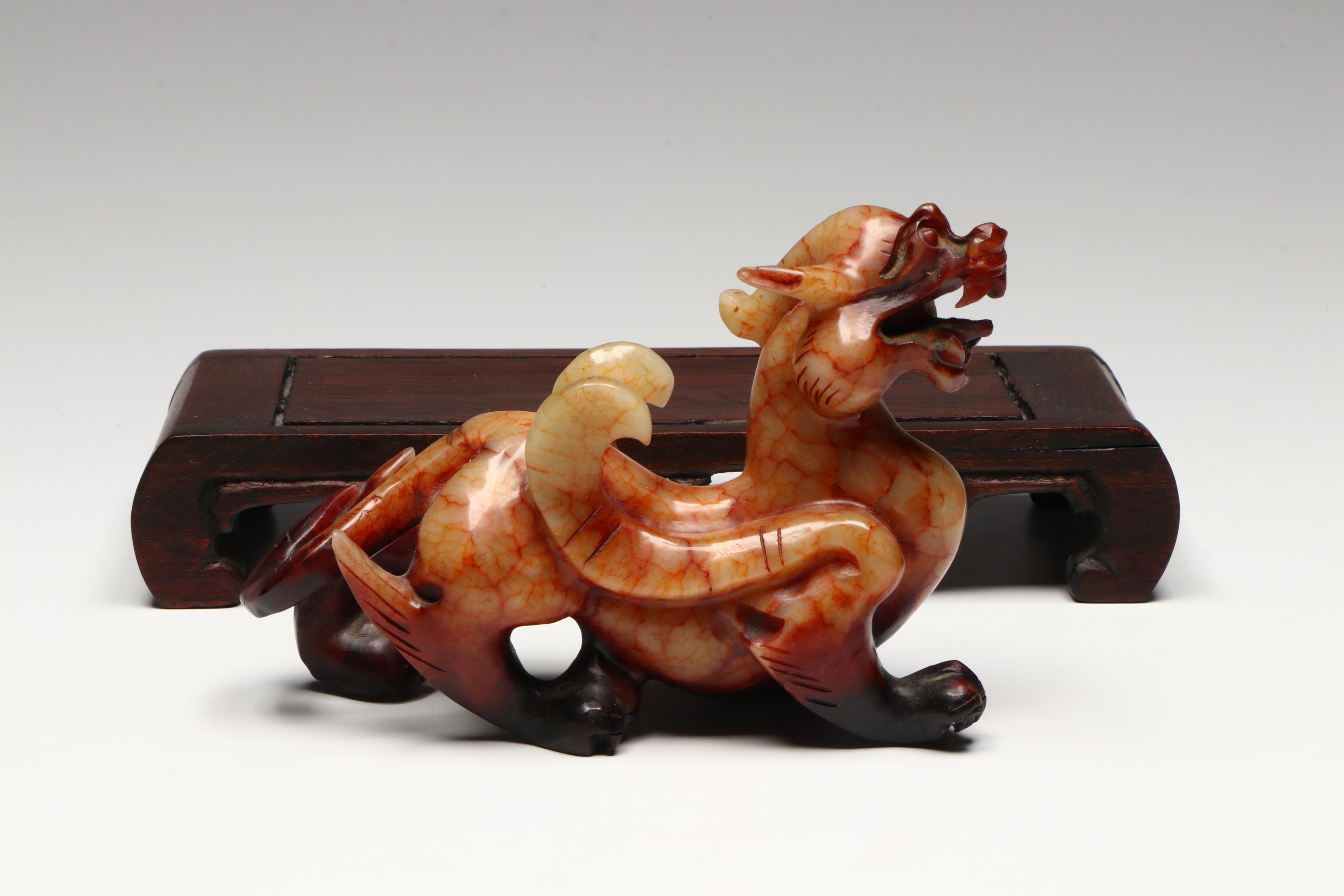 Pair of Chinese Serpentine Dragons on Carved Wood Stands