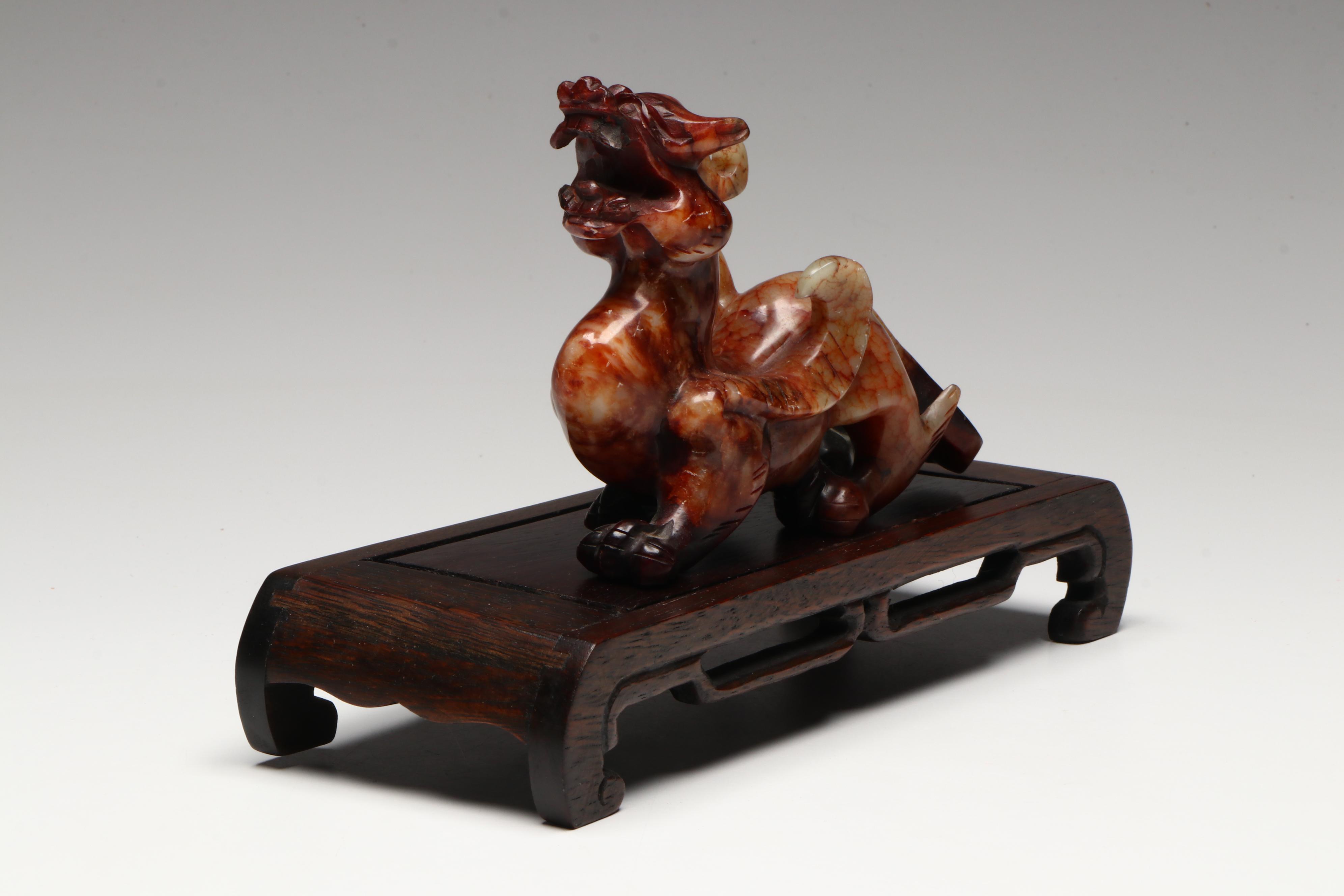 Pair of Chinese Serpentine Dragons on Carved Wood Stands