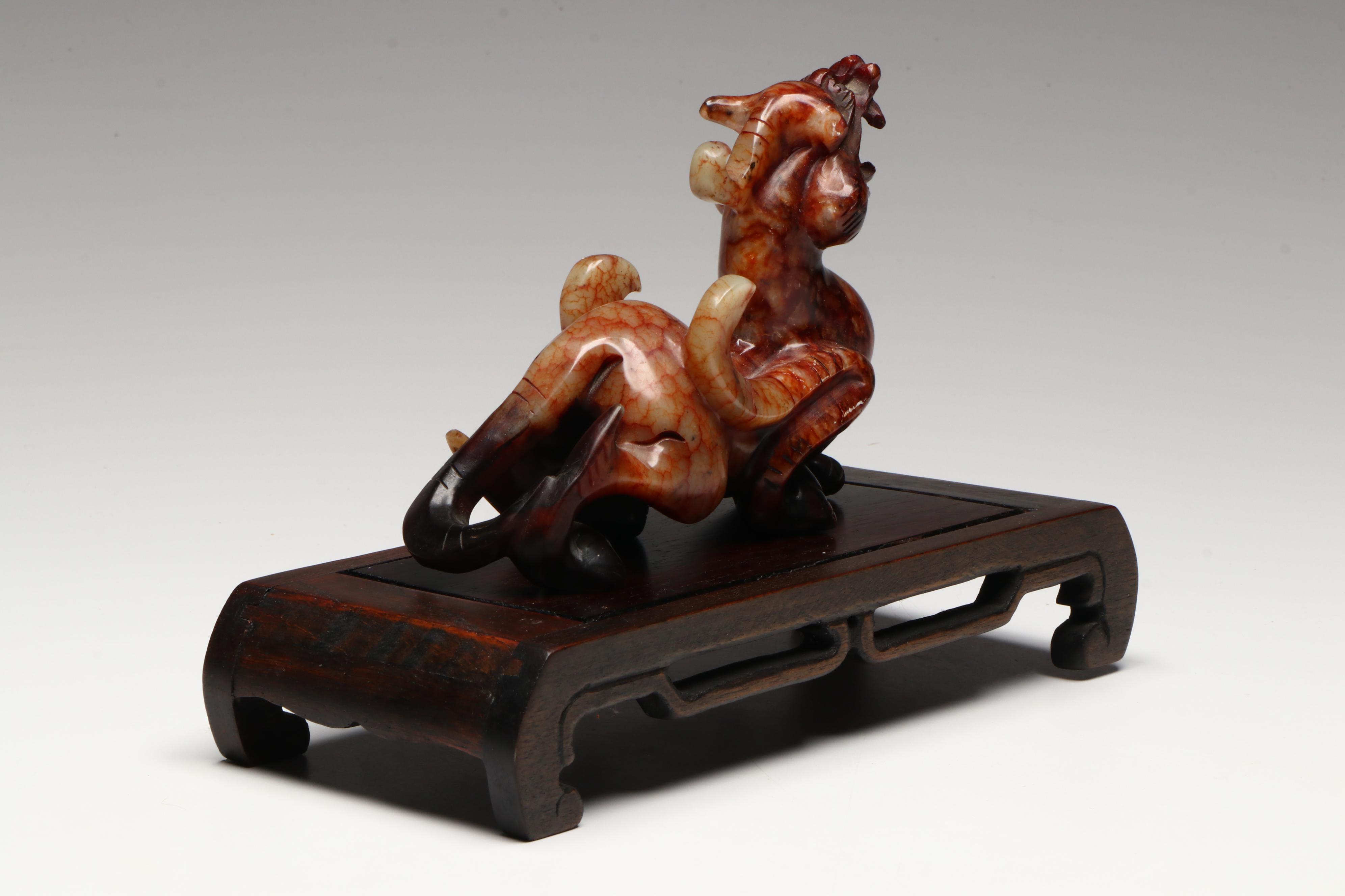Pair of Chinese Serpentine Dragons on Carved Wood Stands