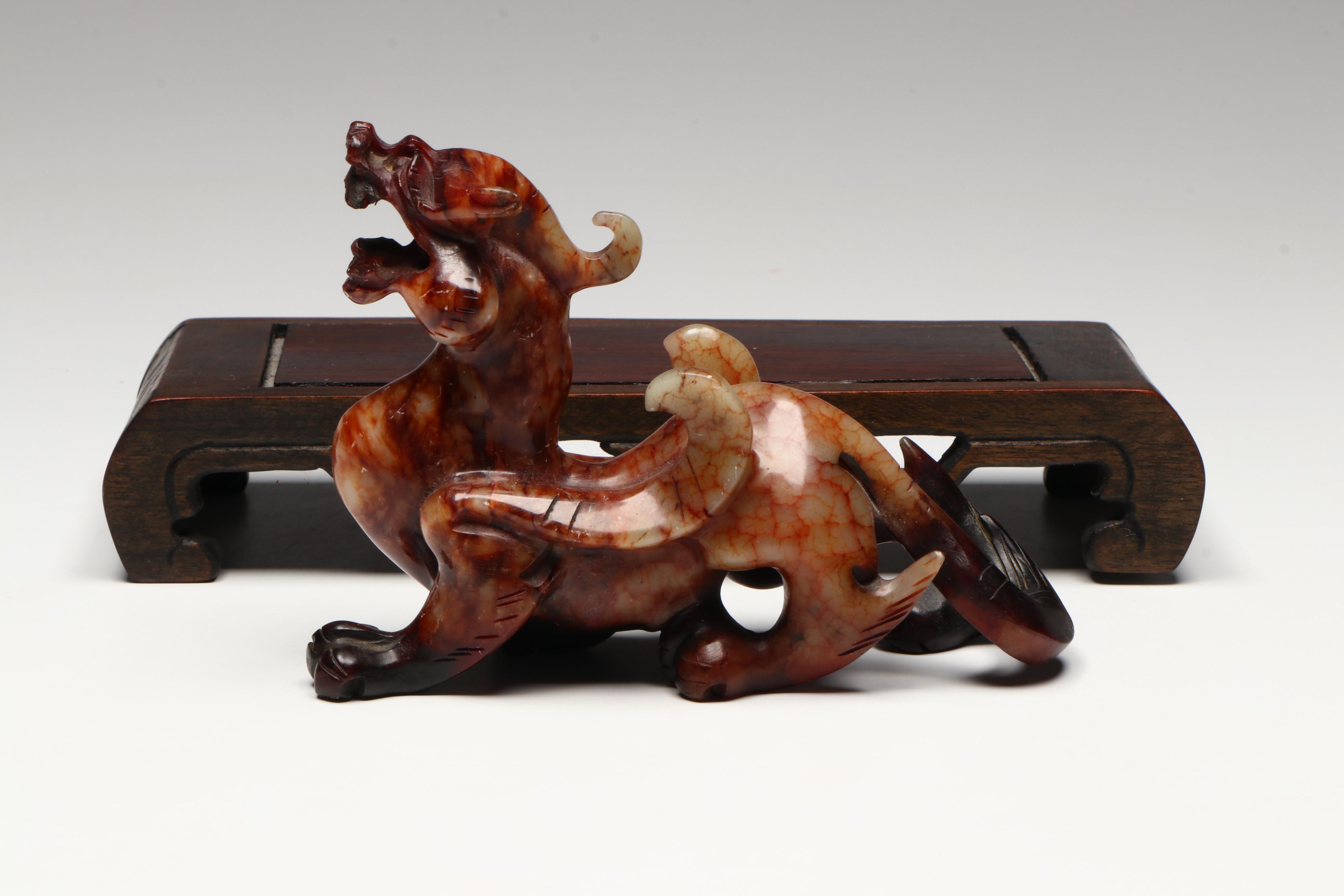 Pair of Chinese Serpentine Dragons on Carved Wood Stands