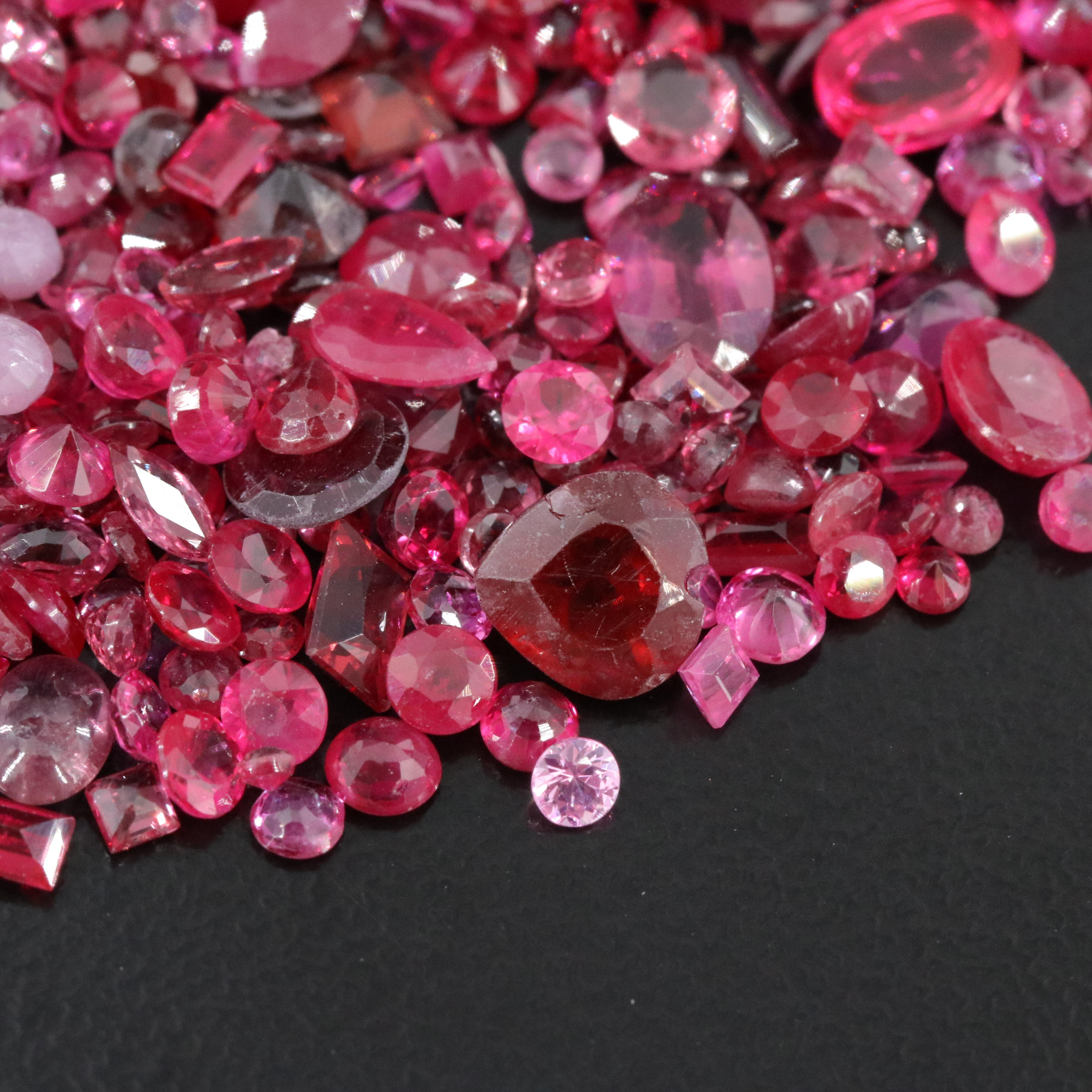 Loose 83.10 CTW Gemstone Lot Including Garnet, Ruby and Sapphire