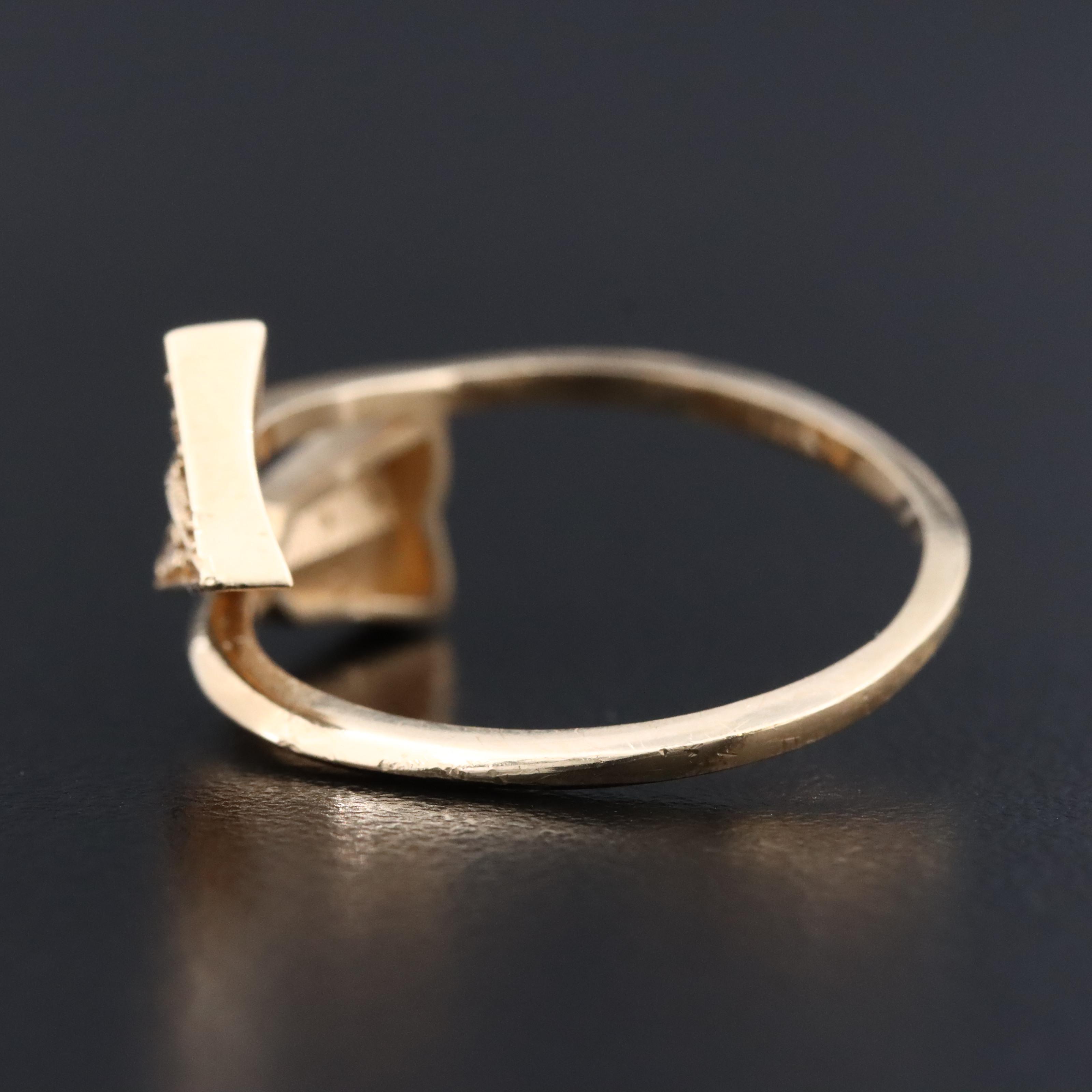 14K 0.14 CTW Diamond Arrow Bypass Wrap Ring