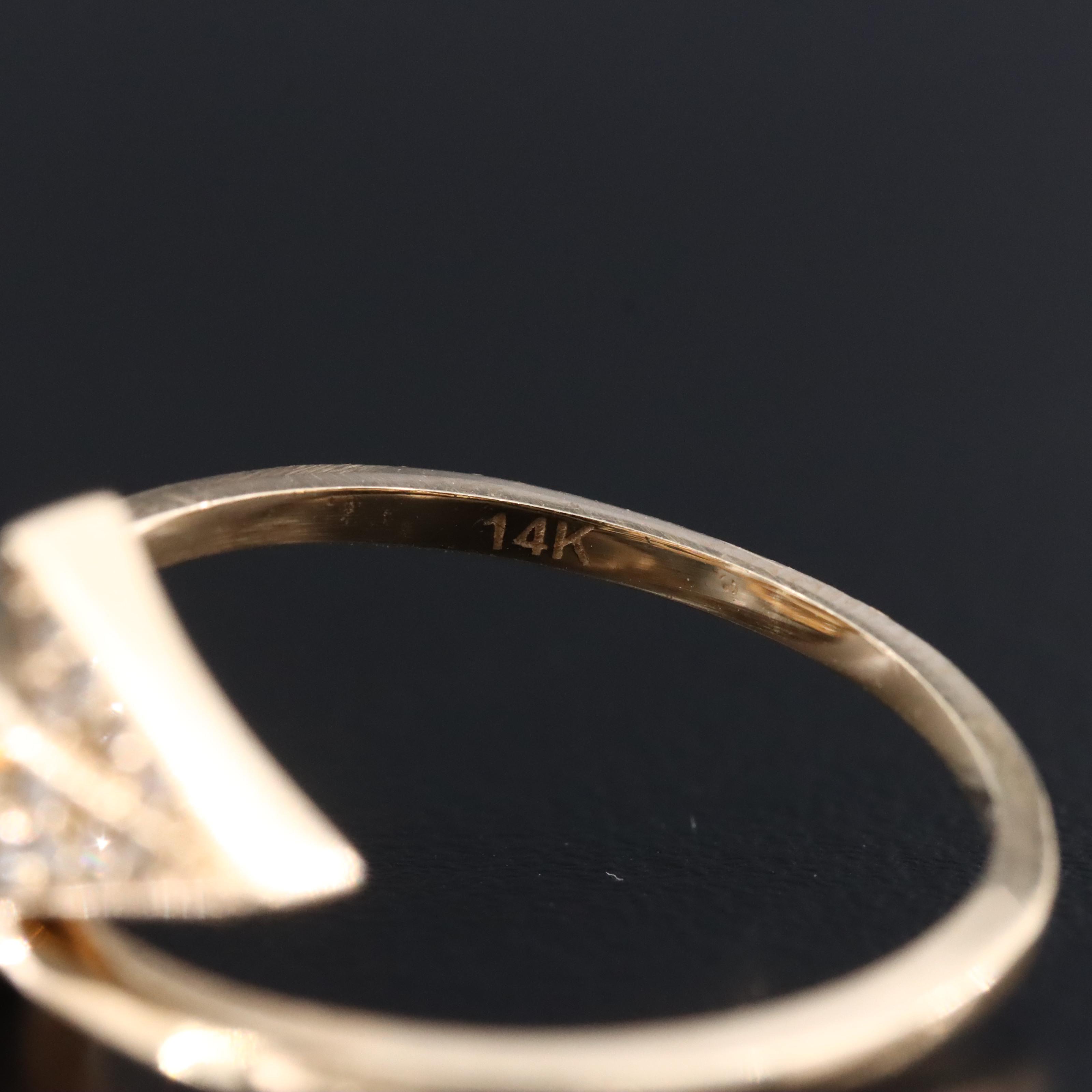 14K 0.14 CTW Diamond Arrow Bypass Wrap Ring