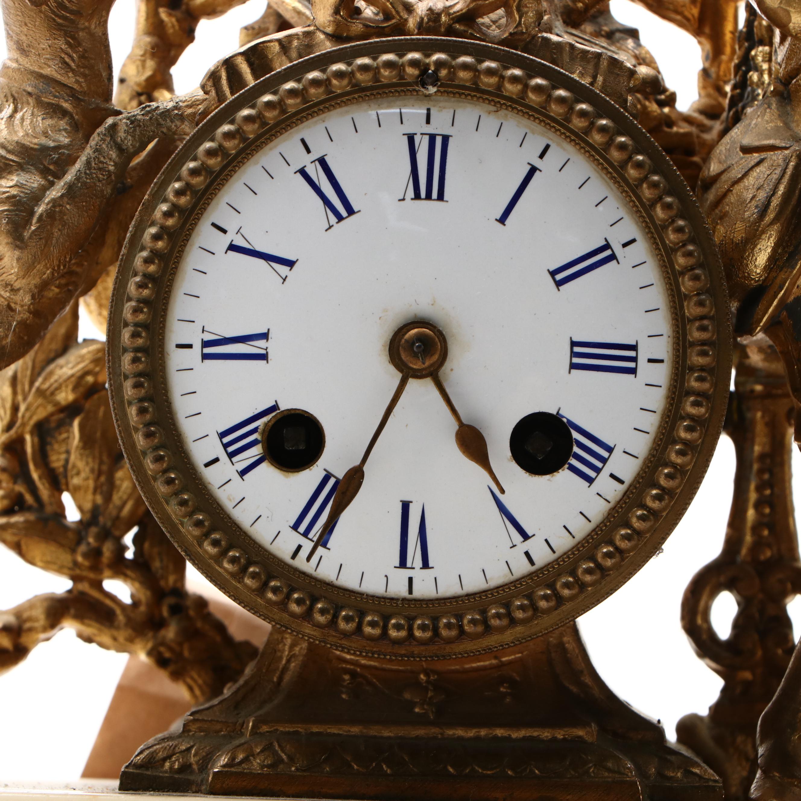 Louis Philippe Style Gilt Metal Figural Mantel Clock on Stone Base