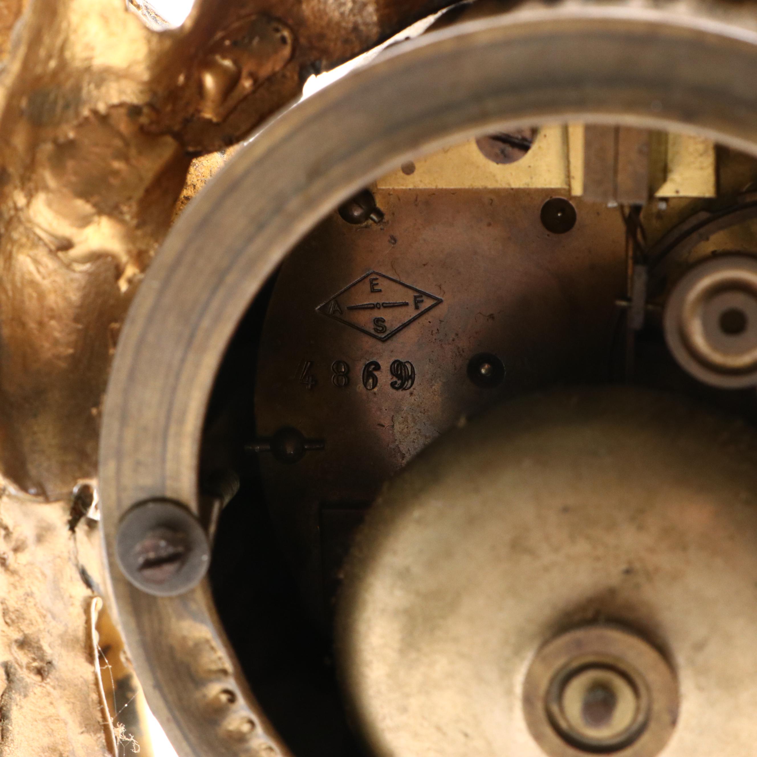 Louis Philippe Style Gilt Metal Figural Mantel Clock on Stone Base