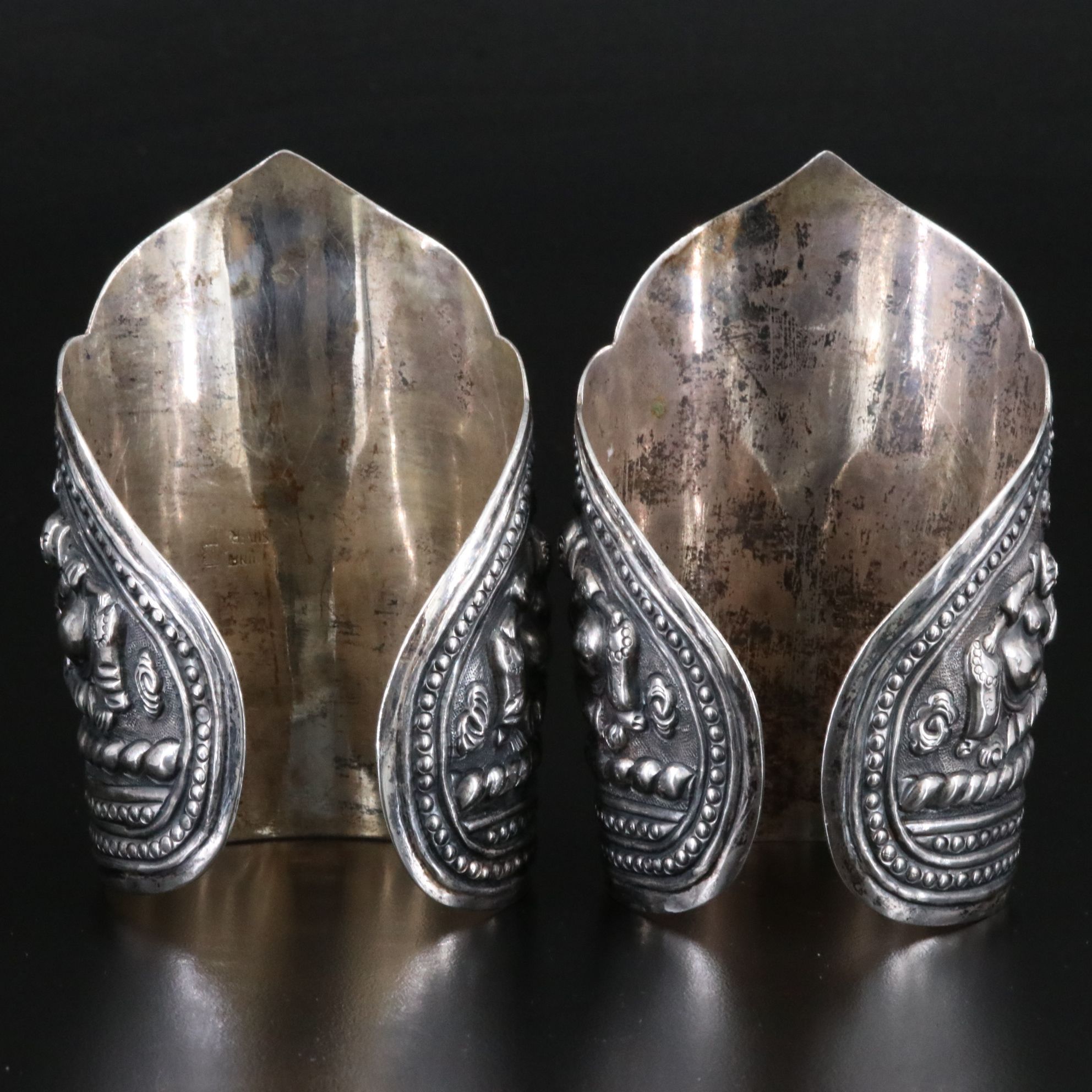Antique Chinese Sterling Pair of Repoussé Buddha and Budai Cuff Bracelets