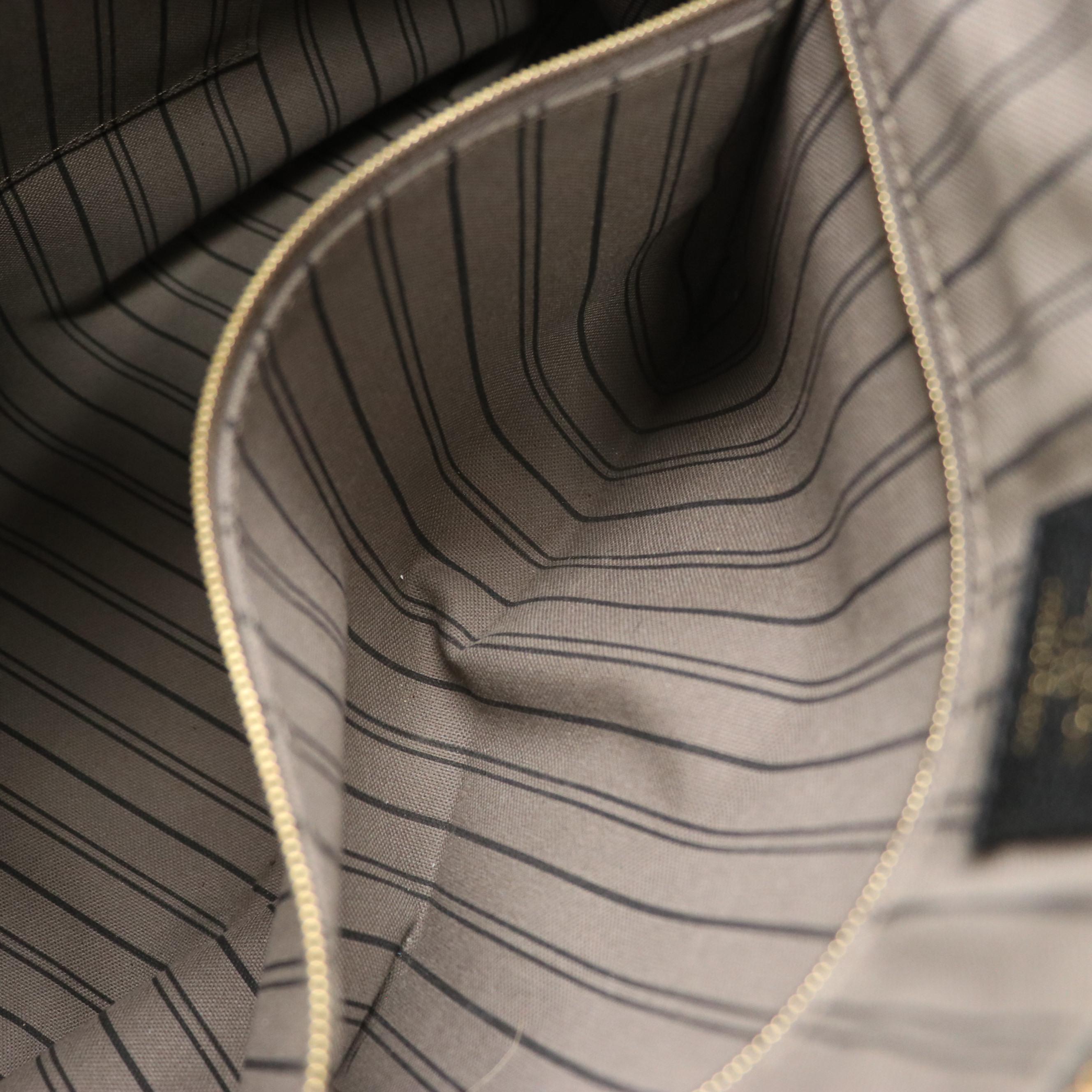 Louis Vuitton Bastille MM Two-Way Bag in Black Monogram Empreinte Leather