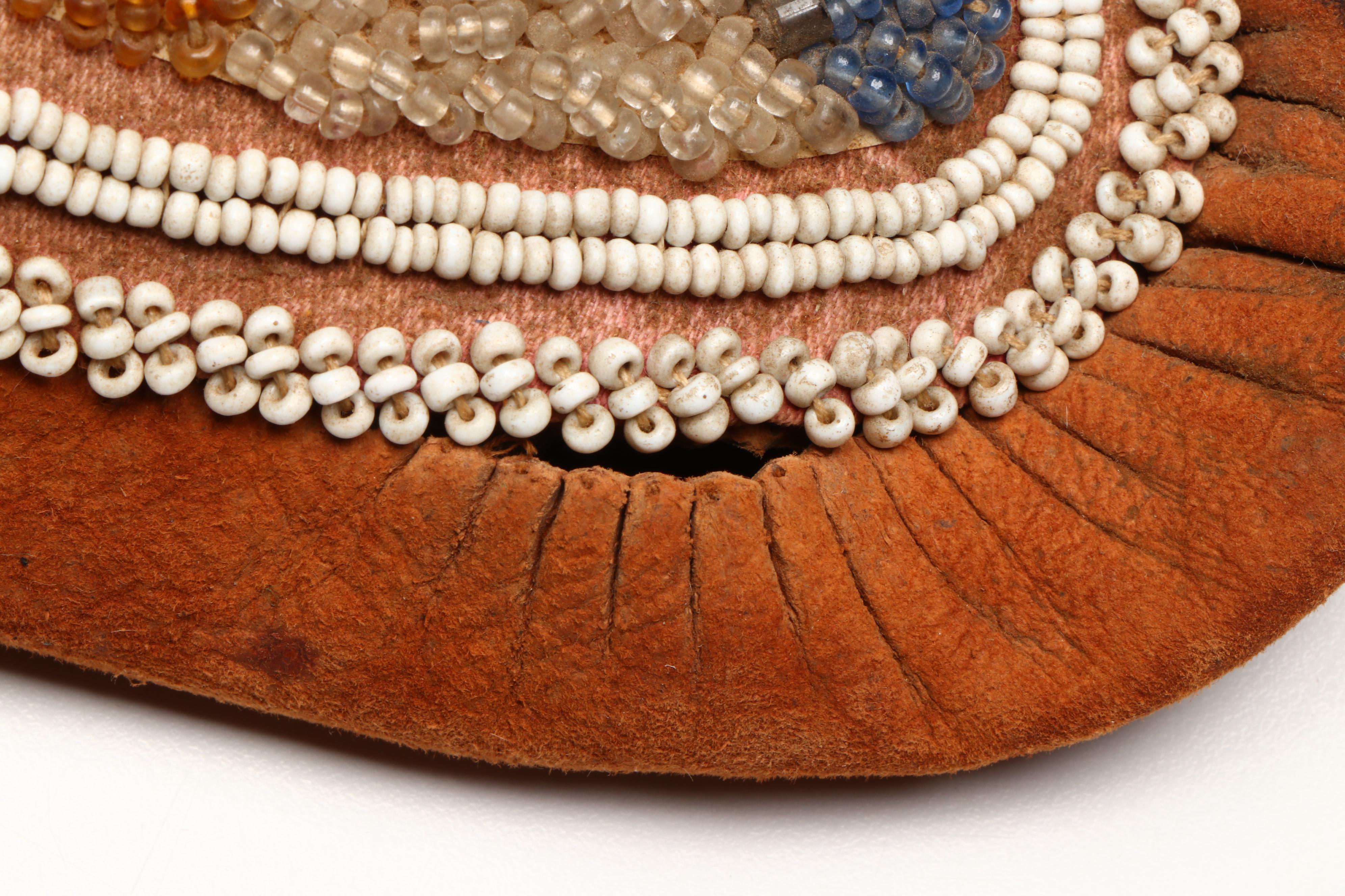 Pair of Haudenosaunee (Iroquois) Hand-Beaded Hide Moccasins