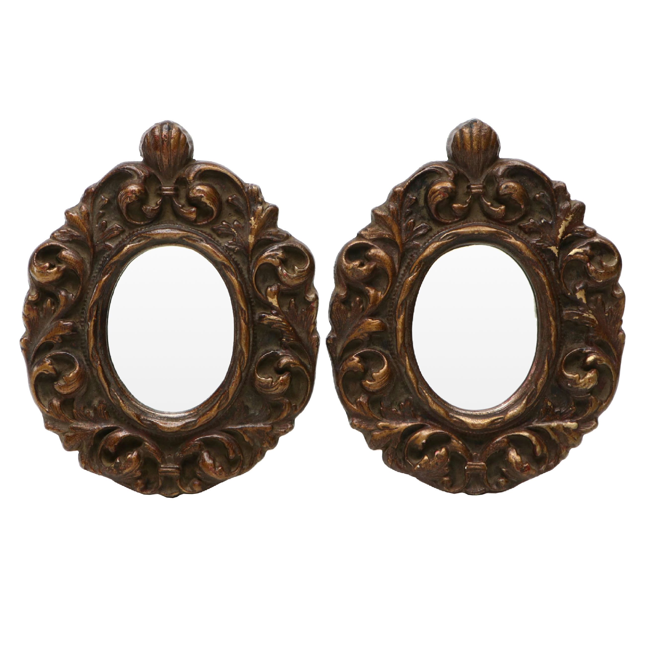 Pair of Italian Baroque Style Gilt Plaster Oval Wall Mirrors