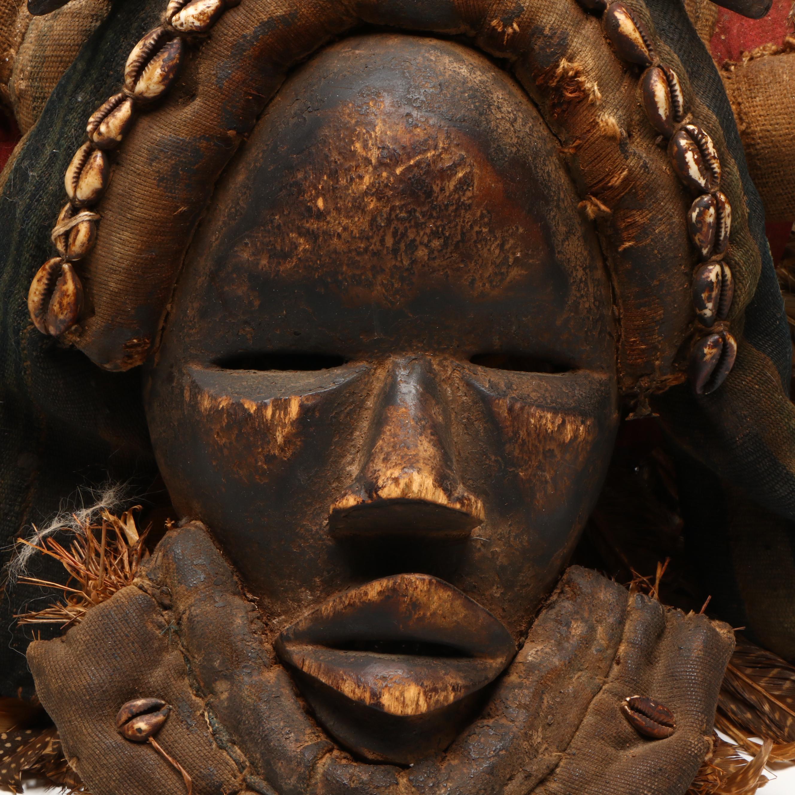 West African Dan People Carved Wood and Natural Material Ceremonial Mask