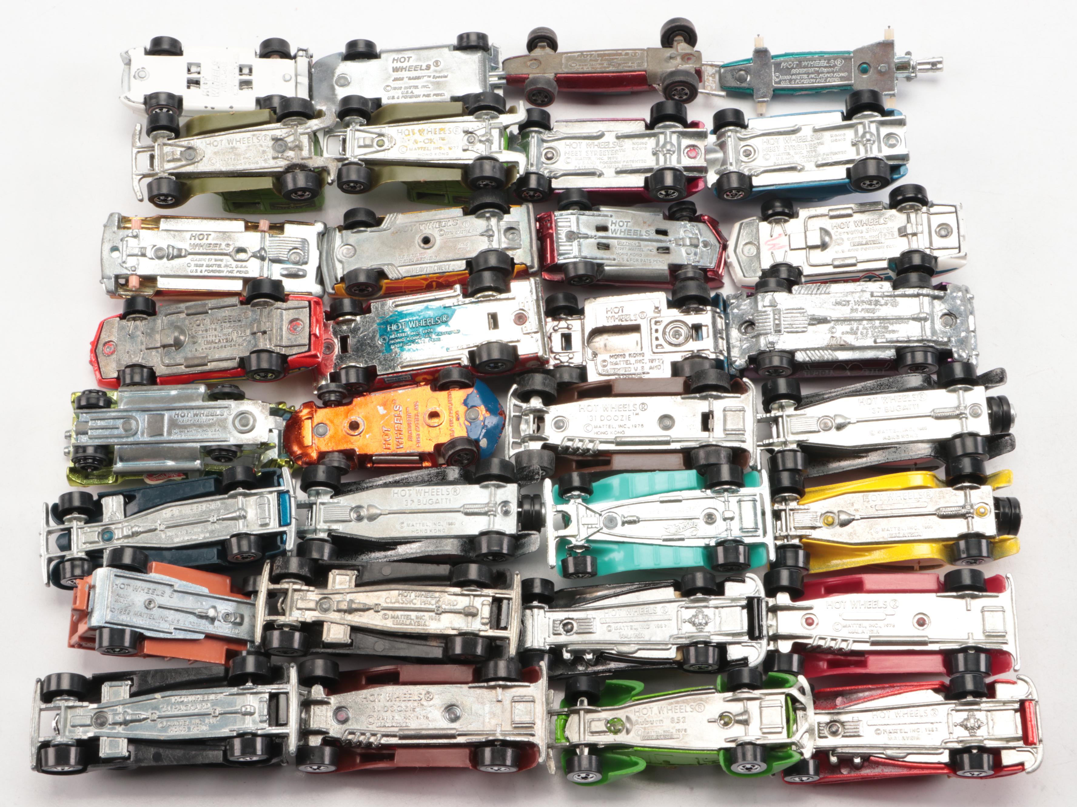 Hot Wheels "Corvette Stingray," "Auburn 852" and More Toy Cars in Cases