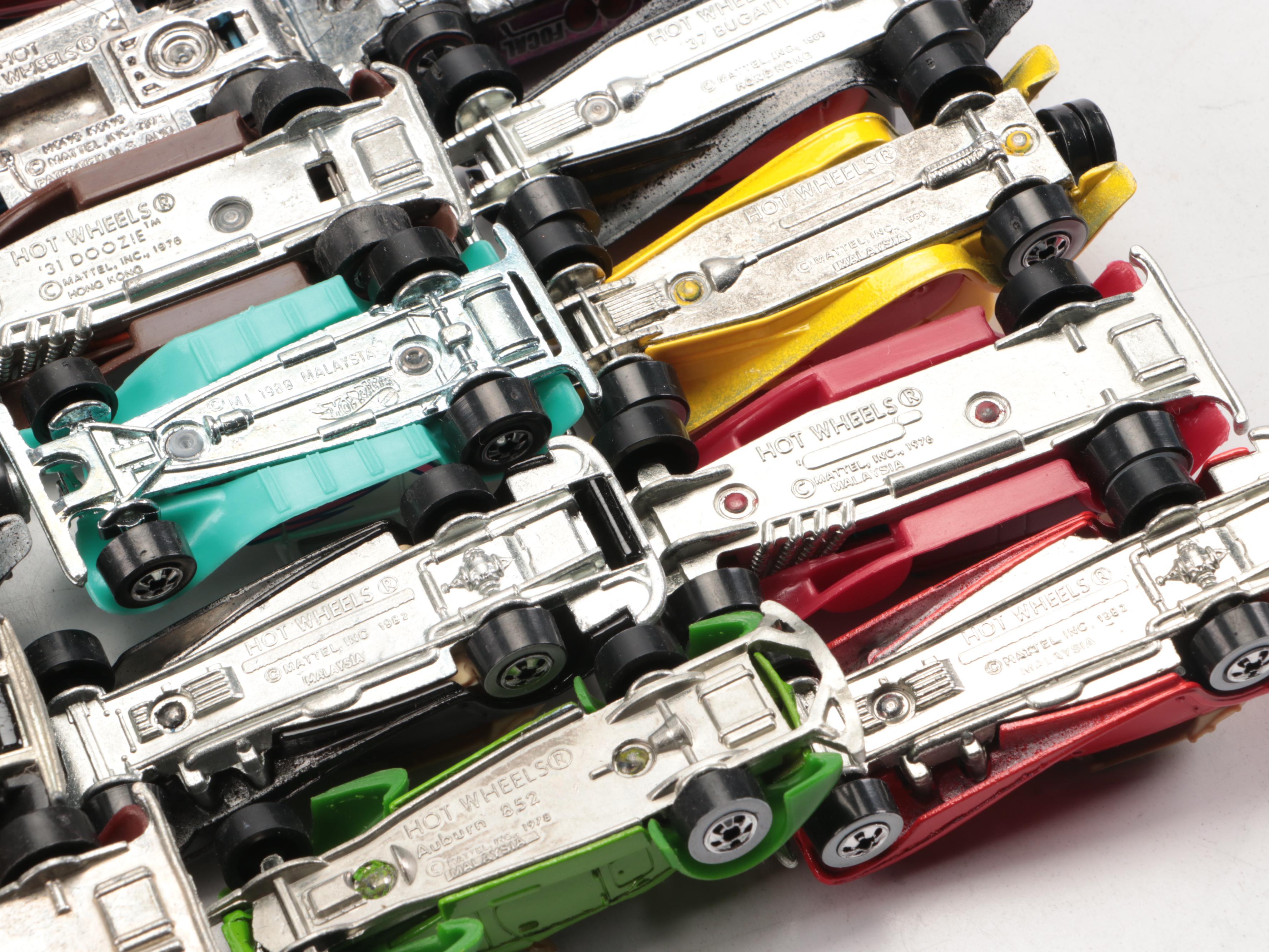 Hot Wheels "Corvette Stingray," "Auburn 852" and More Toy Cars in Cases