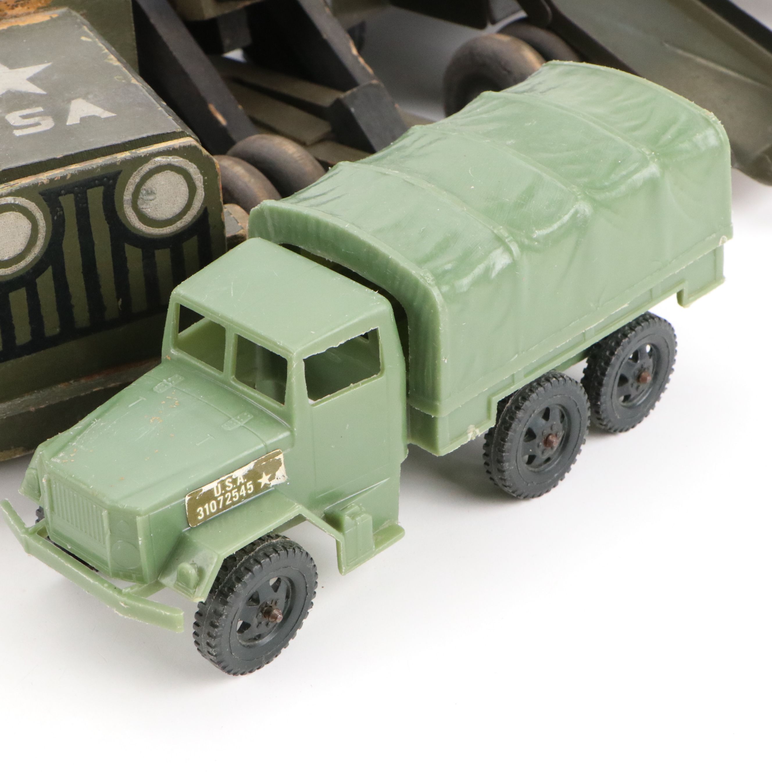 Marx Steel Army Transport Truck with Figurines and Other Toy Military Vehicles