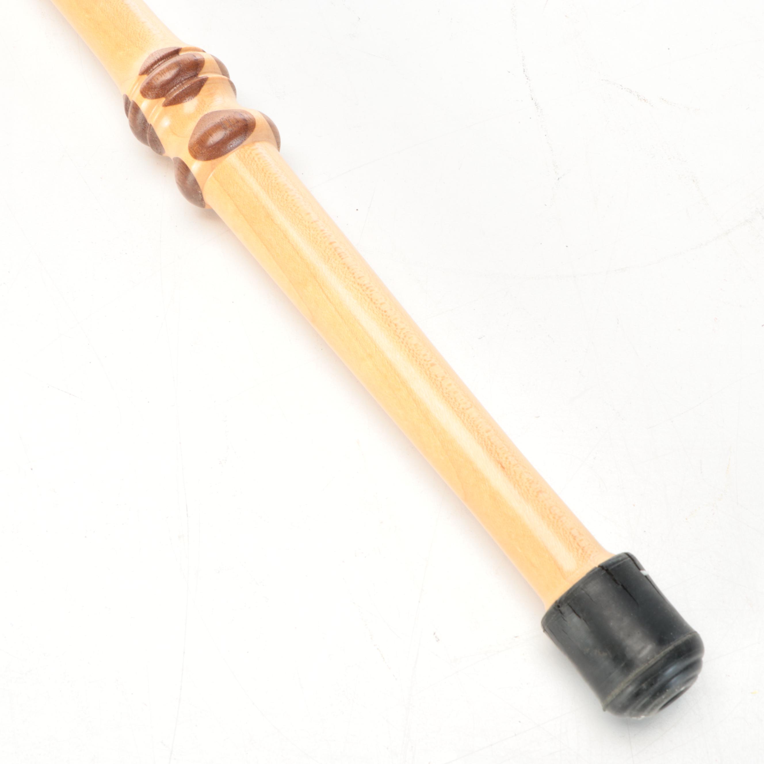 Sam P. Schrock with Other Hand-Carved Wooden Walking Sticks.