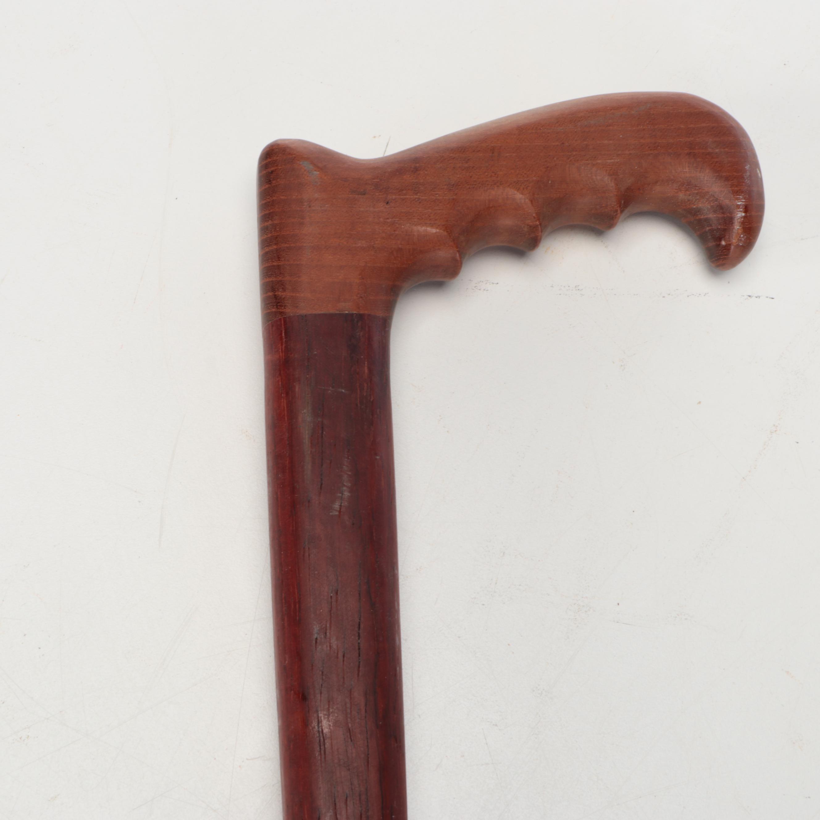 Sam P. Schrock with Other Hand-Carved Wooden Walking Sticks.