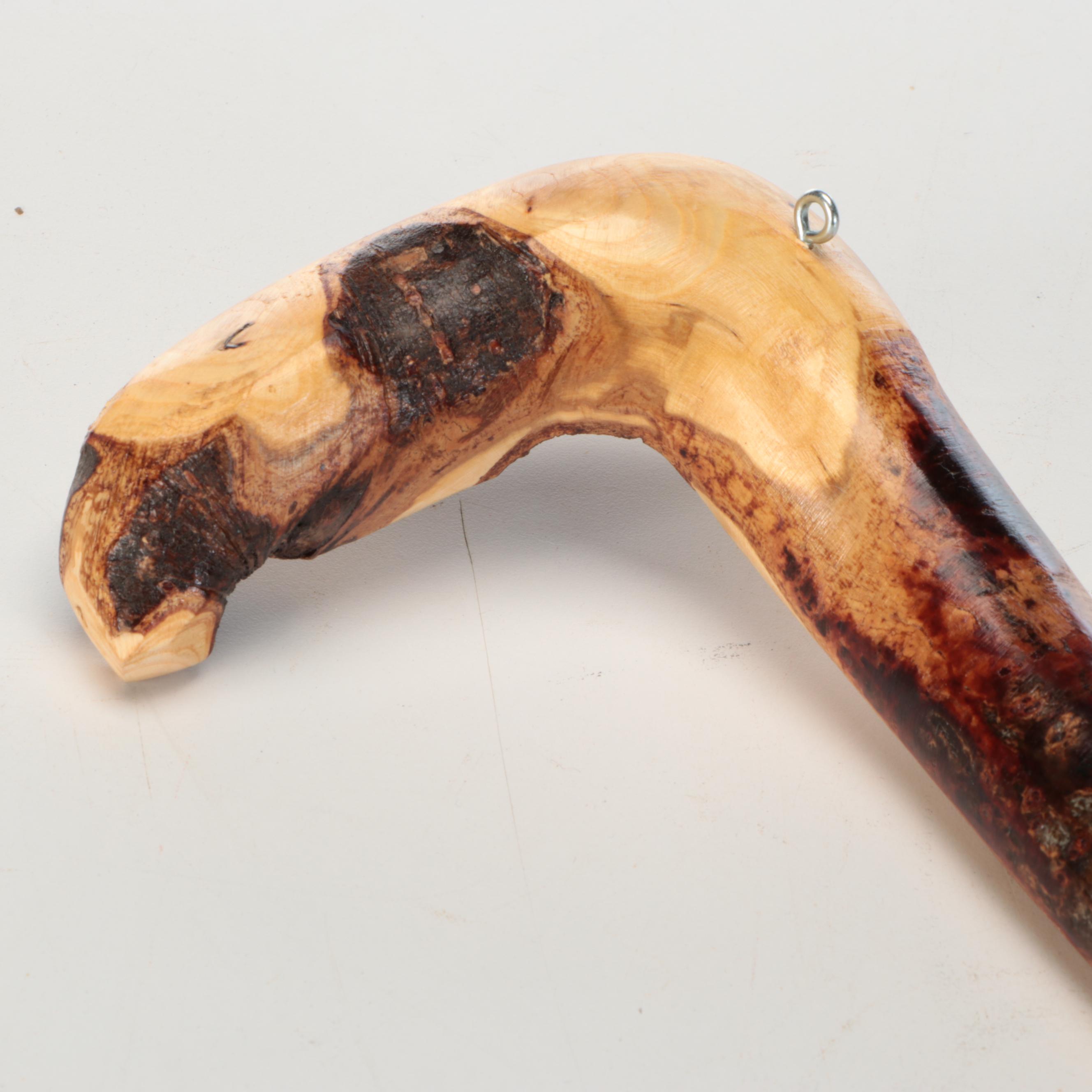 Sam P. Schrock with Other Hand-Carved Wooden Walking Sticks.