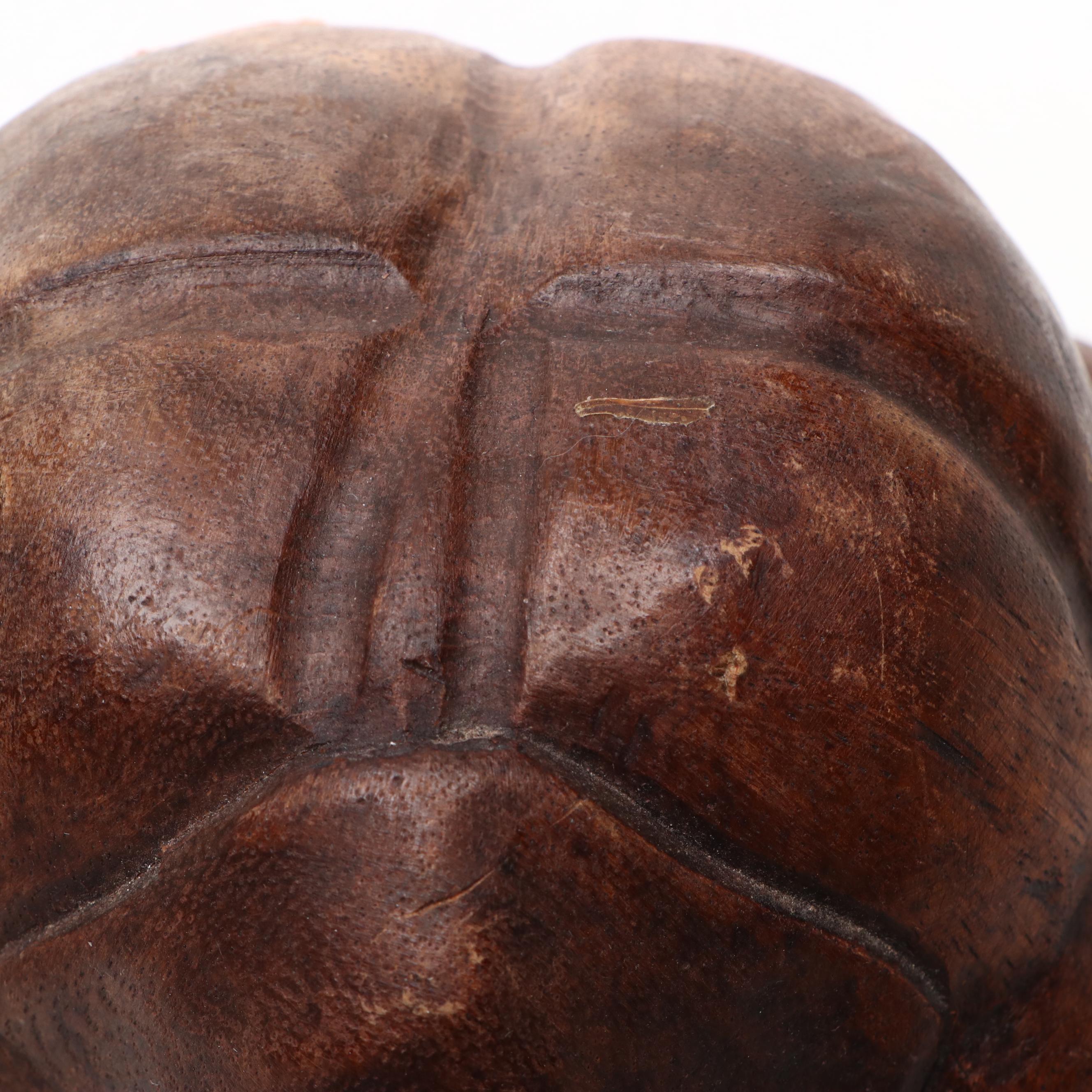 East Asian Hand-Carved Teak Weeping Yogi Figure