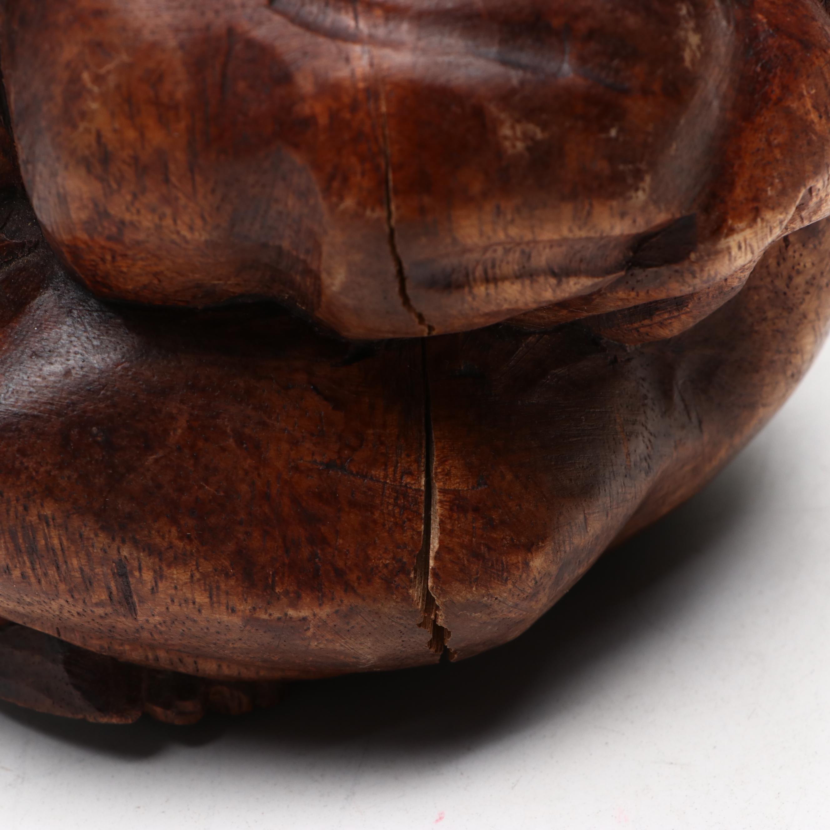 East Asian Hand-Carved Teak Weeping Yogi Figure