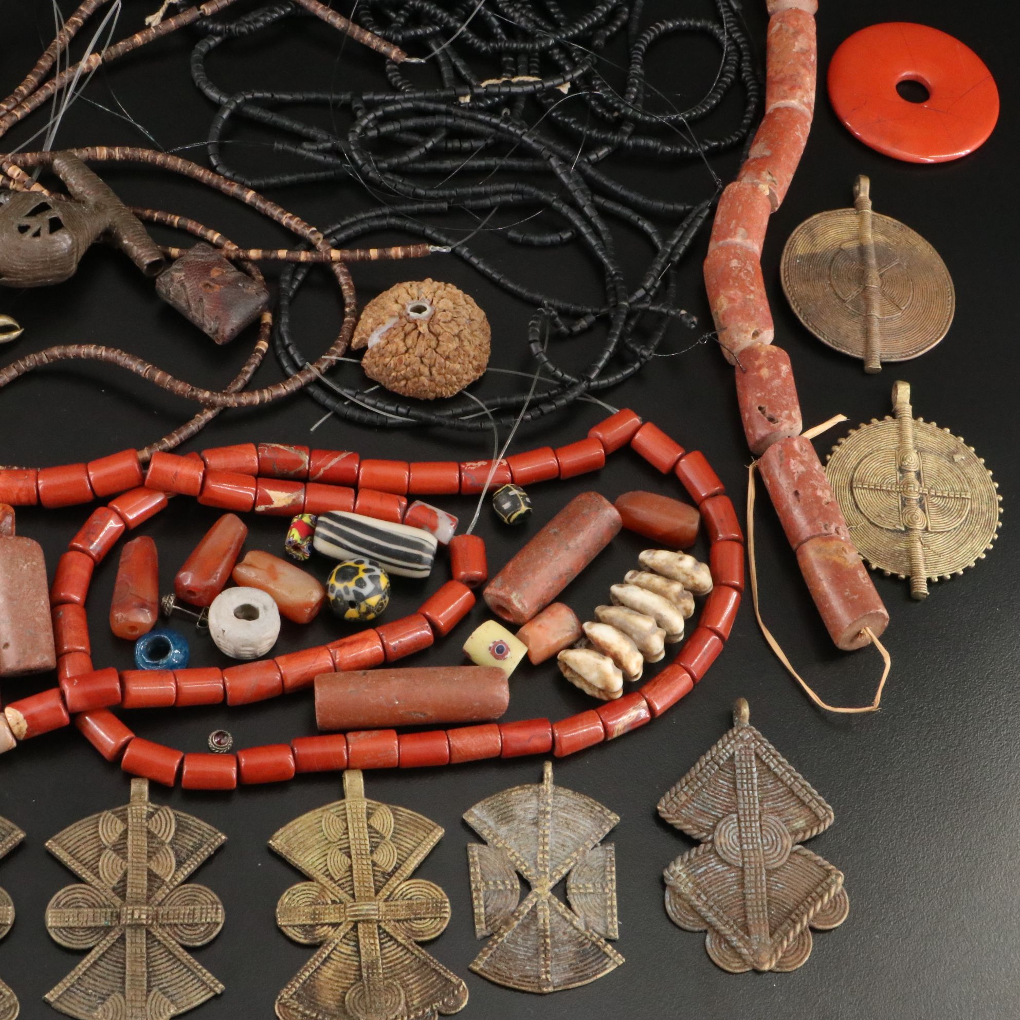Bead and Hank Collection Including African Brass Bells and Cowrie Shell