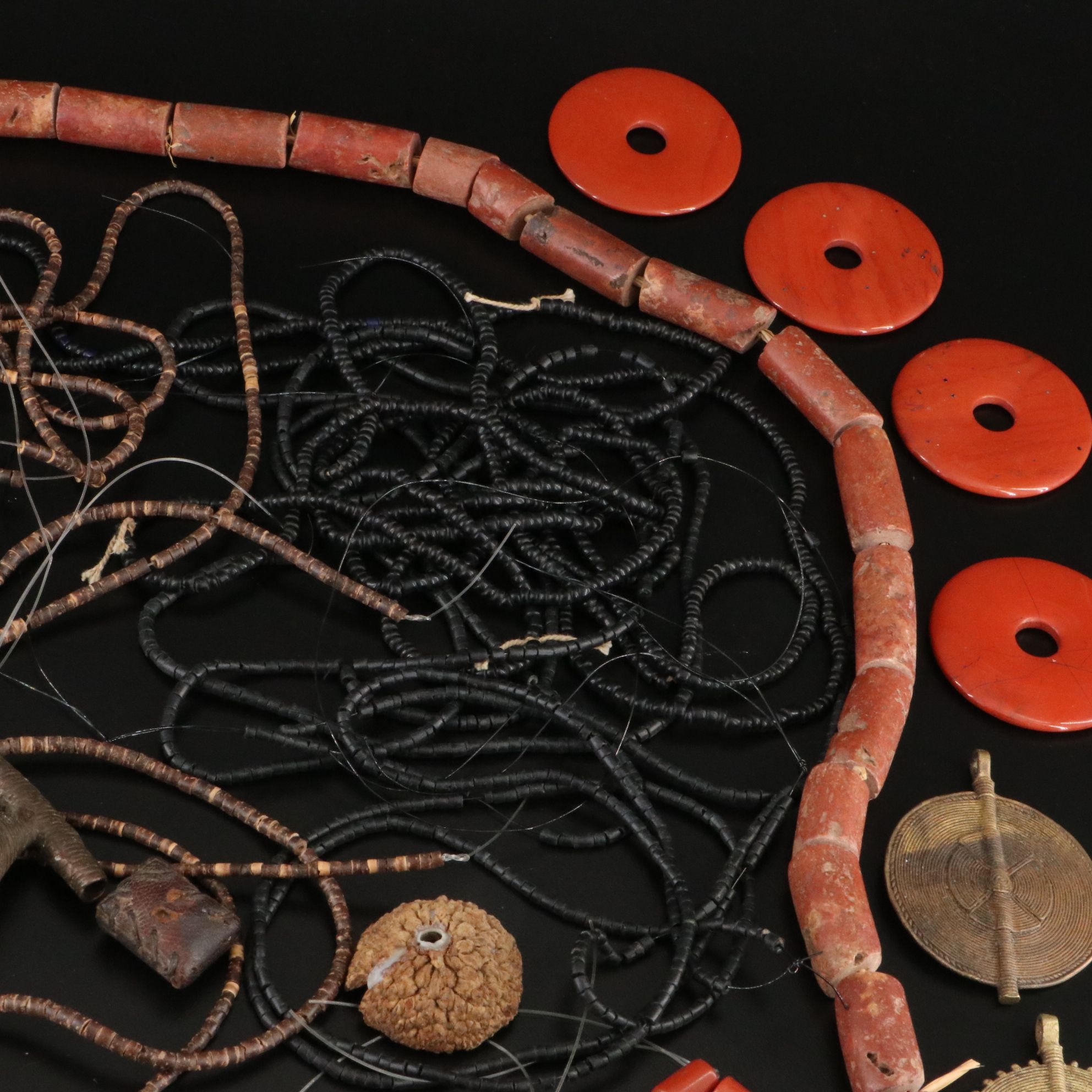 Bead and Hank Collection Including African Brass Bells and Cowrie Shell