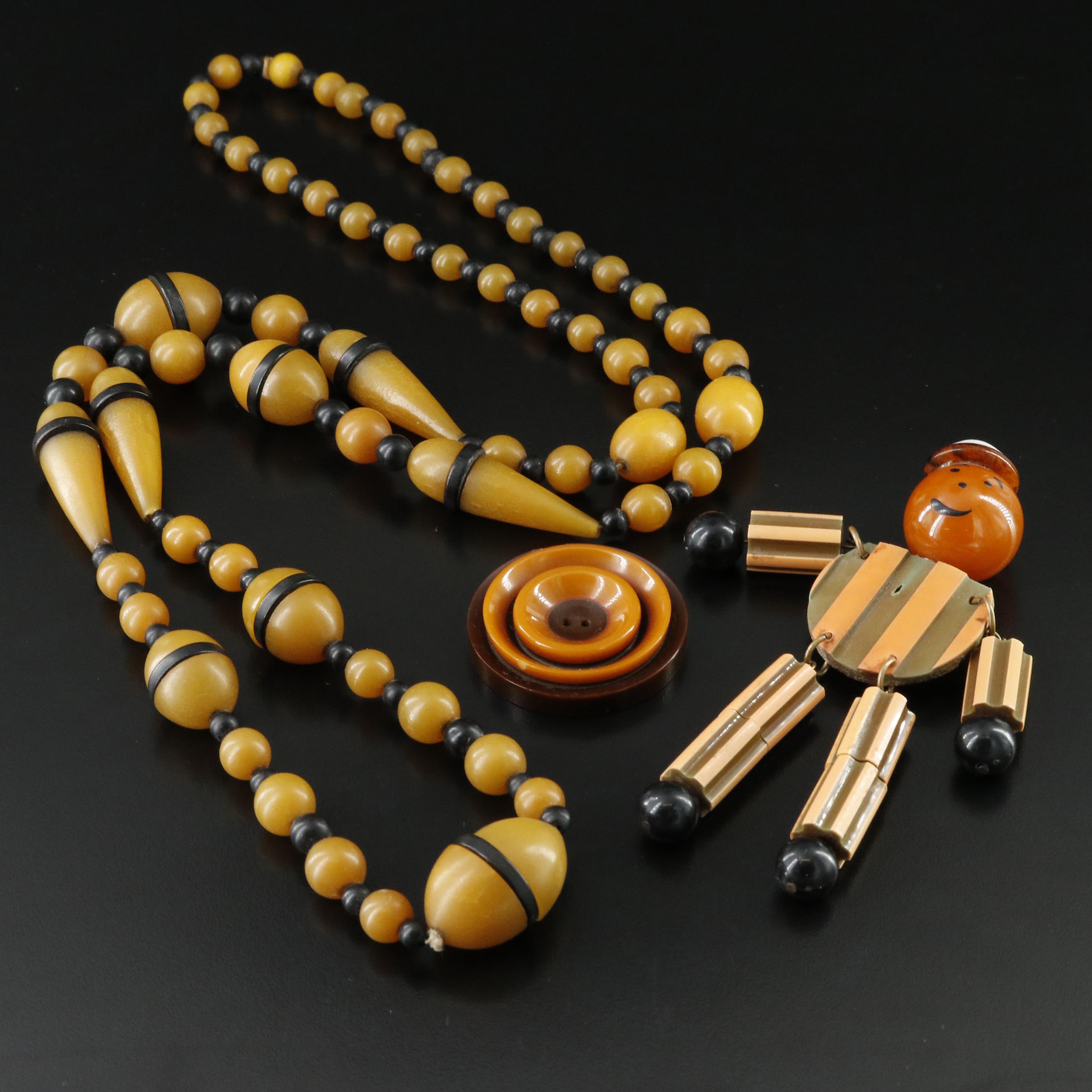 Early Plastic Crib Toy Brooch and Necklace Including Bakelite Button