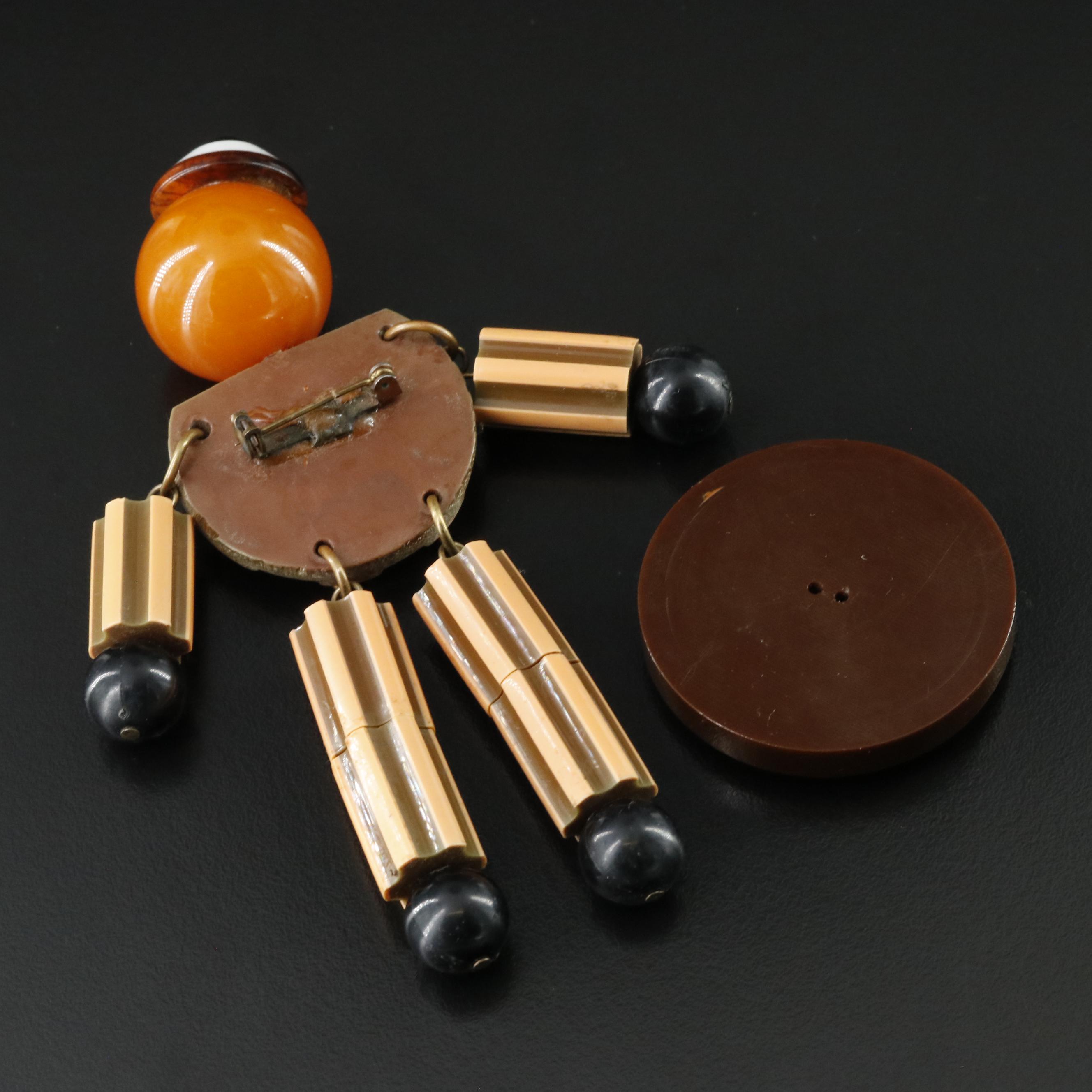 Early Plastic Crib Toy Brooch and Necklace Including Bakelite Button