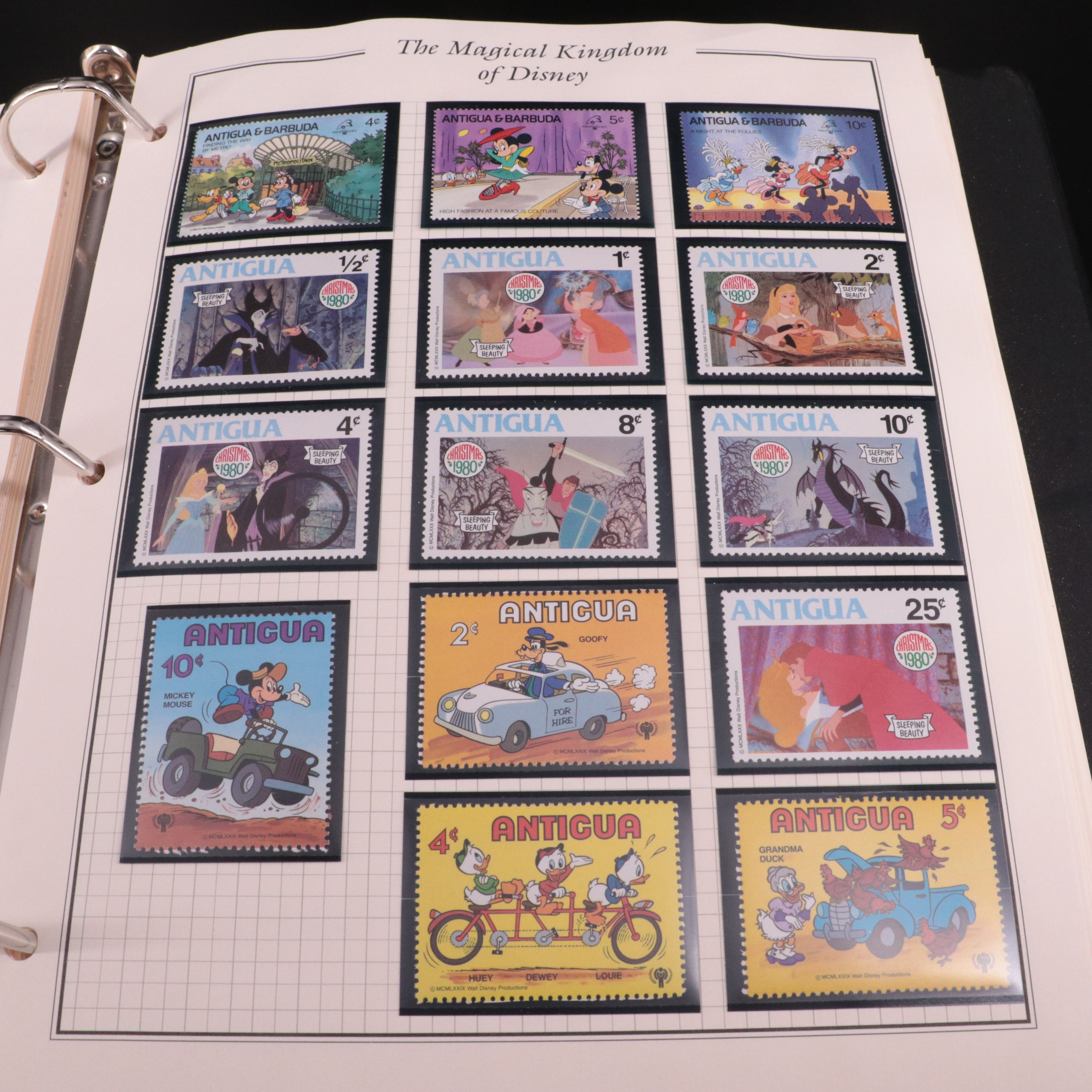 Album of Mint Condition Disney-Themed Postage Stamps