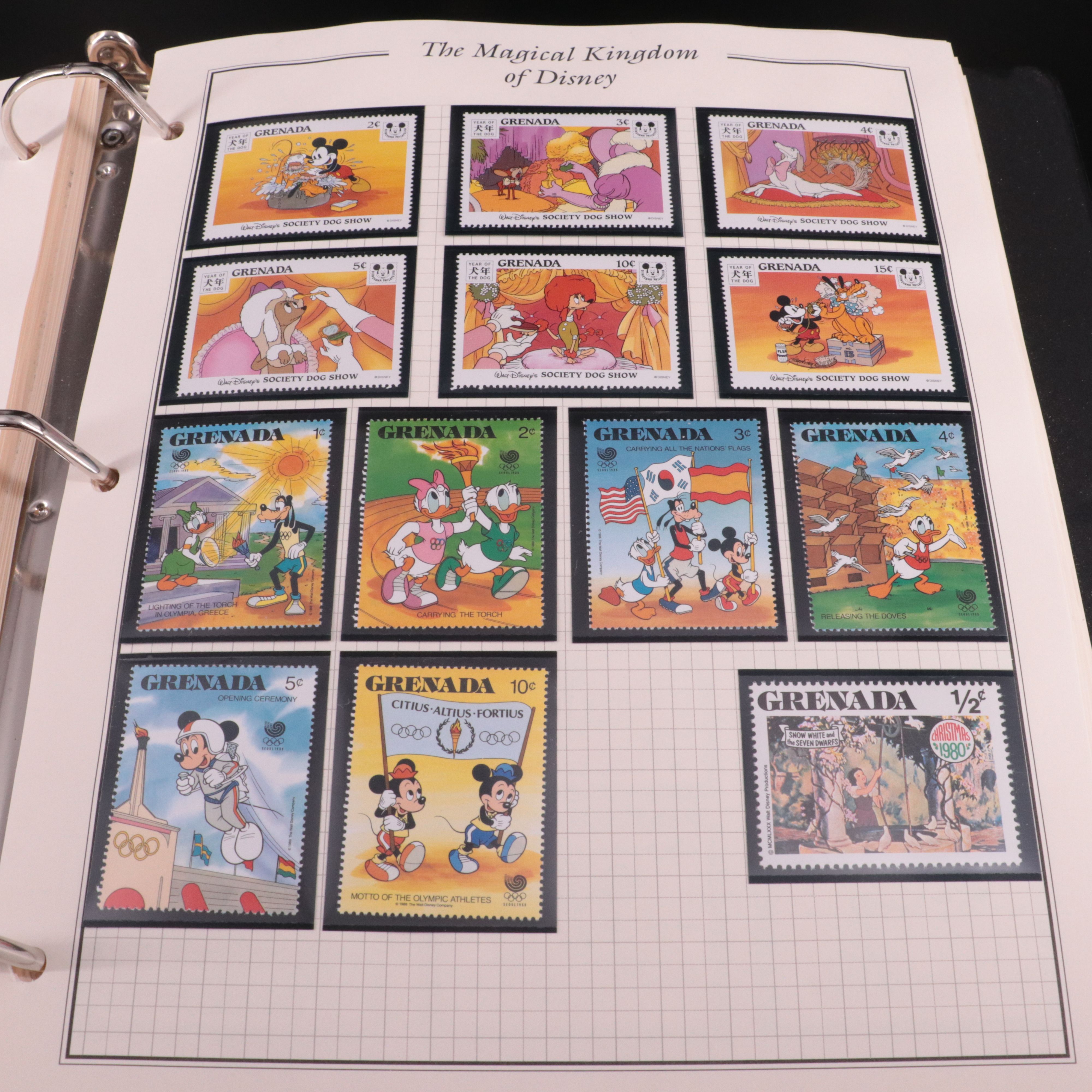 Album of Mint Condition Disney-Themed Postage Stamps